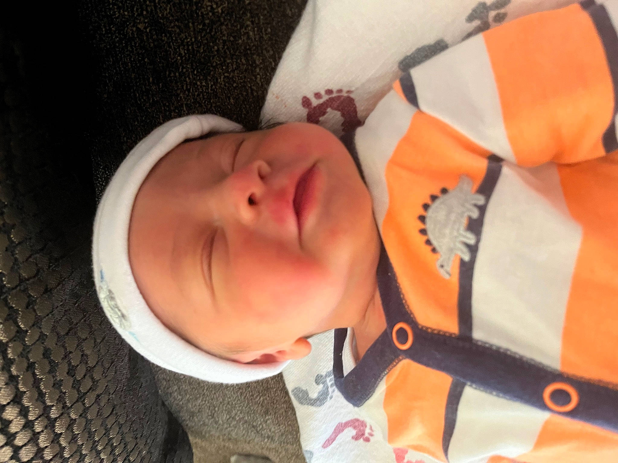 Auden Zubia joined the competition — help win amazing prizes! arm, baby, baby_toddler_clothing, cheek, chin, collar, comfort, eyebrow, eyelash, finger, hand, head, headwear, human_body, lip, neck, nose, orange, person, skin