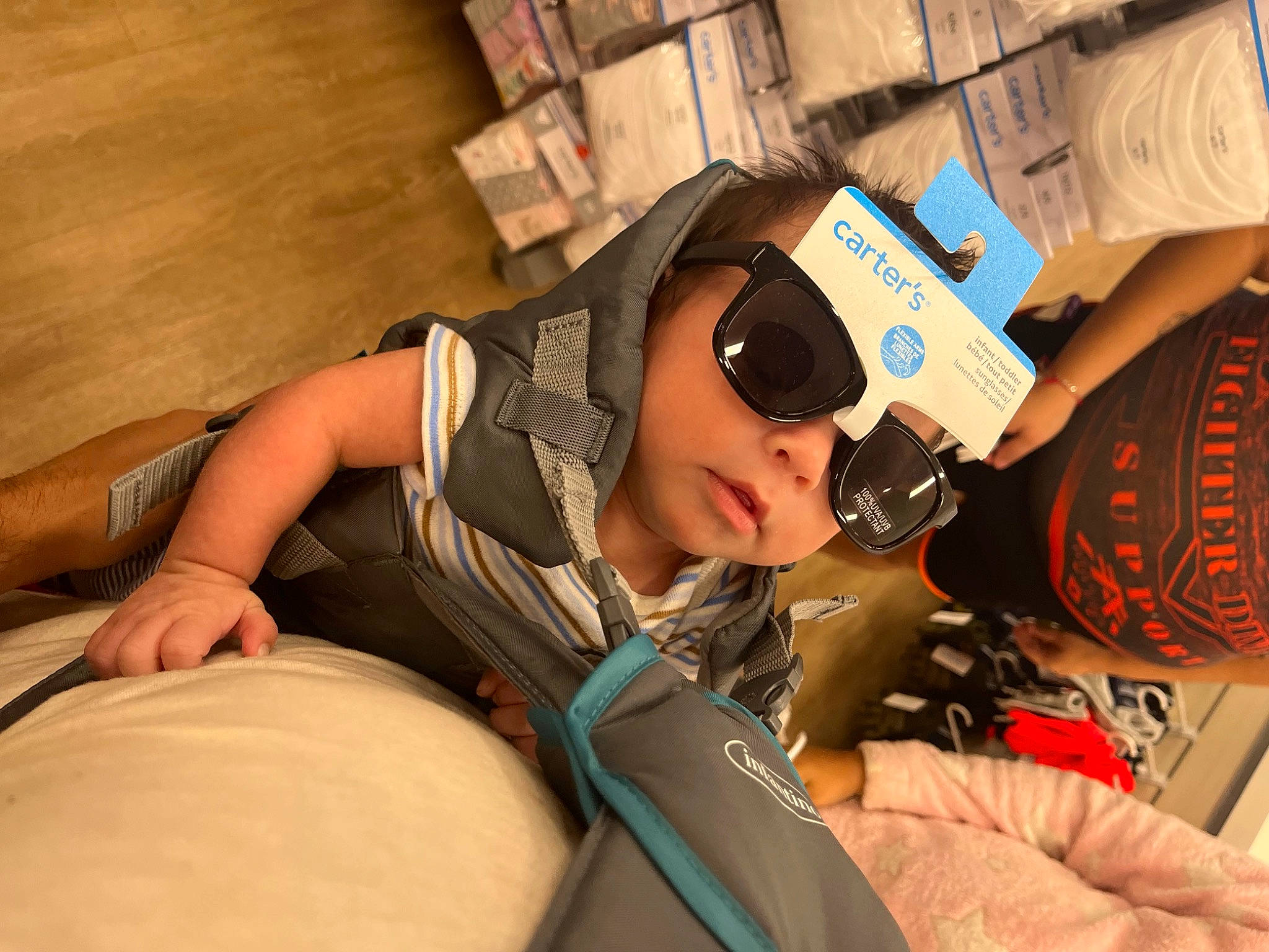 Auden Zubia joined the competition — help win amazing prizes! baseball_cap, comfort, elbow, eyewear, flooring, fun, goggles, hat, headwear, human_leg, job, leisure, person, personal_protective_equipment, recreation, room, sitting, sunglasses, t_shirt, thigh