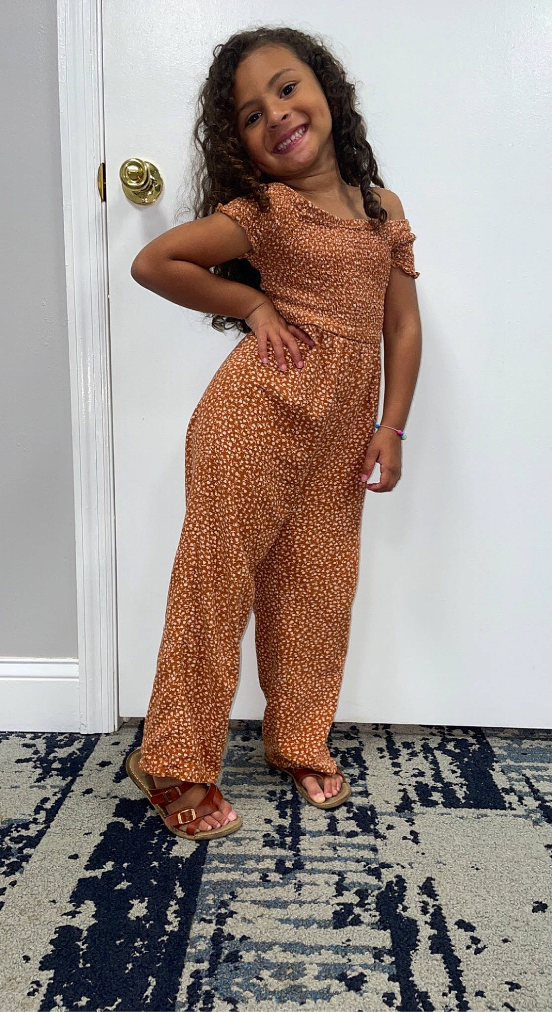 Emaleigh is registered to the contest to win money with this photo: arm, brown_hair, clothing, fashion_design, fashion_model, flooring, formal_wear, hair, human_leg, joy, knee, long_hair, neck, pattern, person, shoulder, sleeve, smile, thigh, trunk