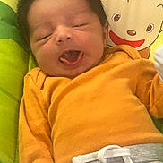 Arthur joined the competition — help win amazing prizes! baby, infant, sleepy, yawning, orange_sweater, gray_pants, white_gloves, cartoon_bear, colorful_cushion, cute, child, portrait, indoors, soft_toys, comfort, toddler, smiling_cartoon, young_child, cozy, relaxing