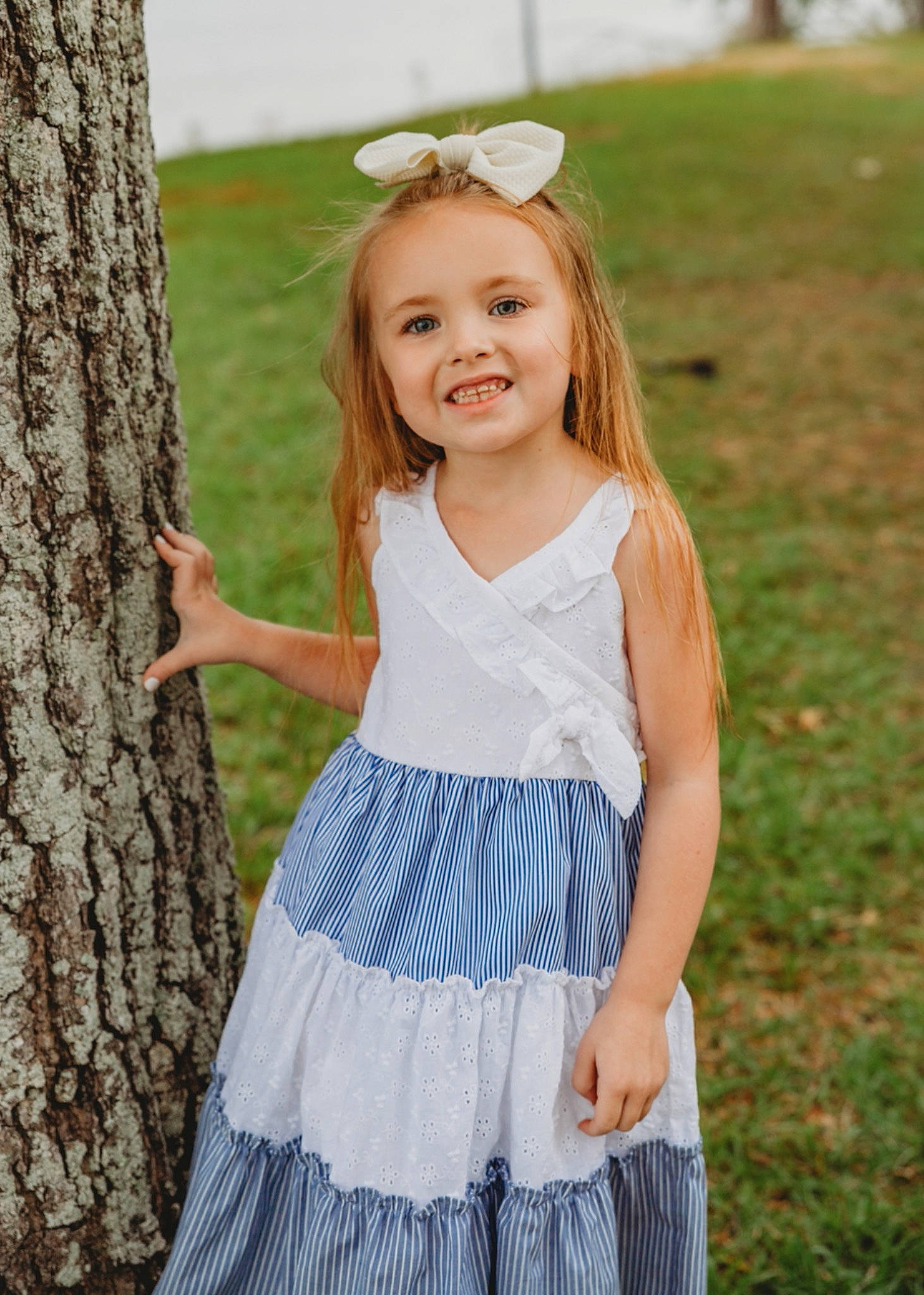 Evalynn joined the competition — help win amazing prizes! baby_toddler_clothing, blond, child, child_model, clothing, day_dress, embellishment, hair_accessory, happy, headband, headpiece, joy, long_hair, one_piece_garment, pattern, people_in_nature, person, portrait_photography, spring, summer