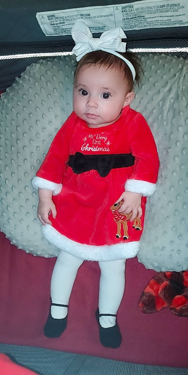 Hazel joined the competition — help win amazing prizes! baby, baby_toddler_clothing, carmine, child, costume, costume_hat, event, holiday, pattern, person, pink, red, sleeve, sock, toddler