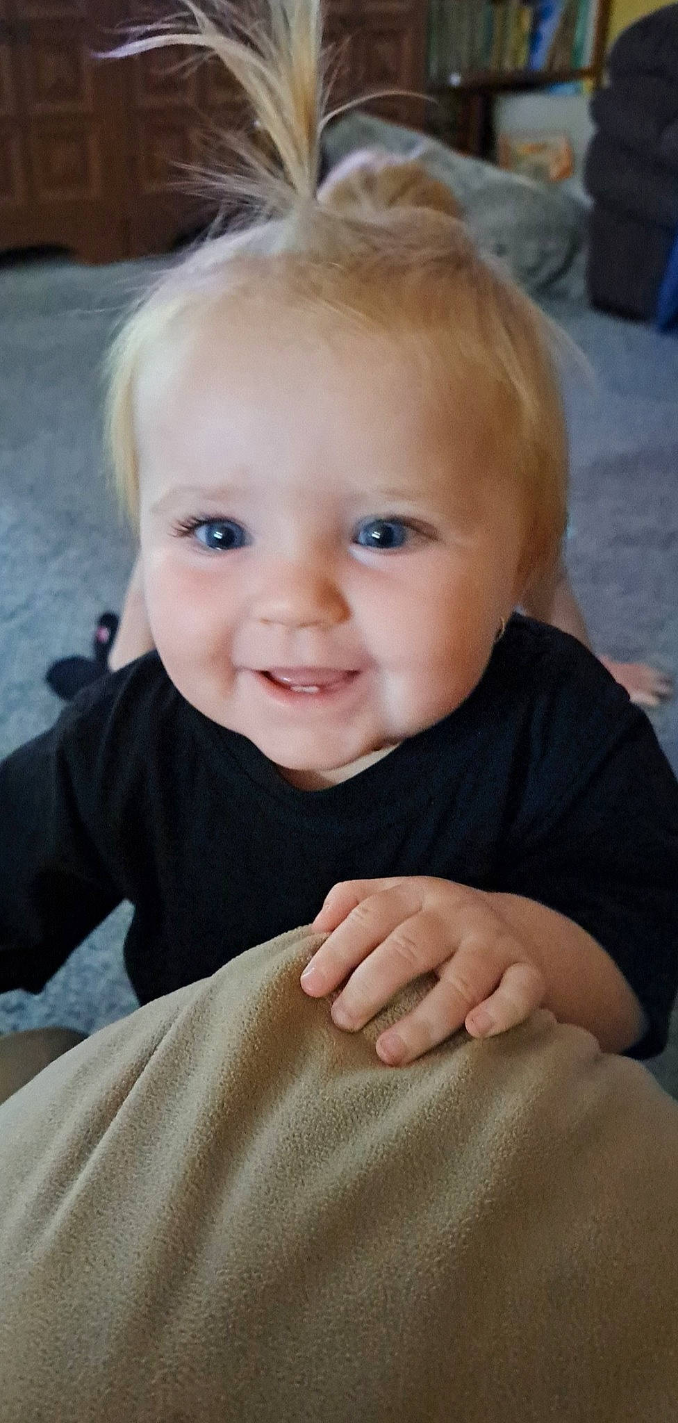 Georgia is registered to the contest to win money with this photo: baby, blond, cheek, child, chin, eye, eyebrow, flash_photography, fun, gesture, happy, iris, joy, lip, nose, person, sitting, skin, sleeve, smile