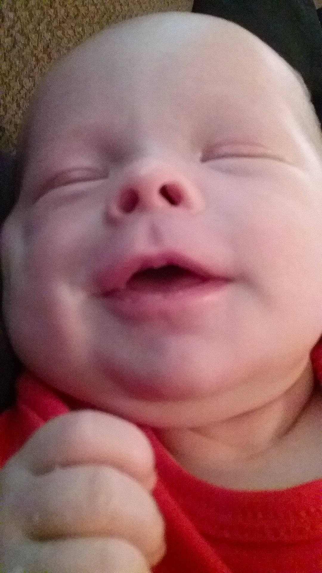 Jaxston is registered to the contest to win money with this photo: cheek, child, chin, close_up, face, finger, forehead, hand, head, infant, laughter, lip, mouth, nose, person, skin, smile, toddler