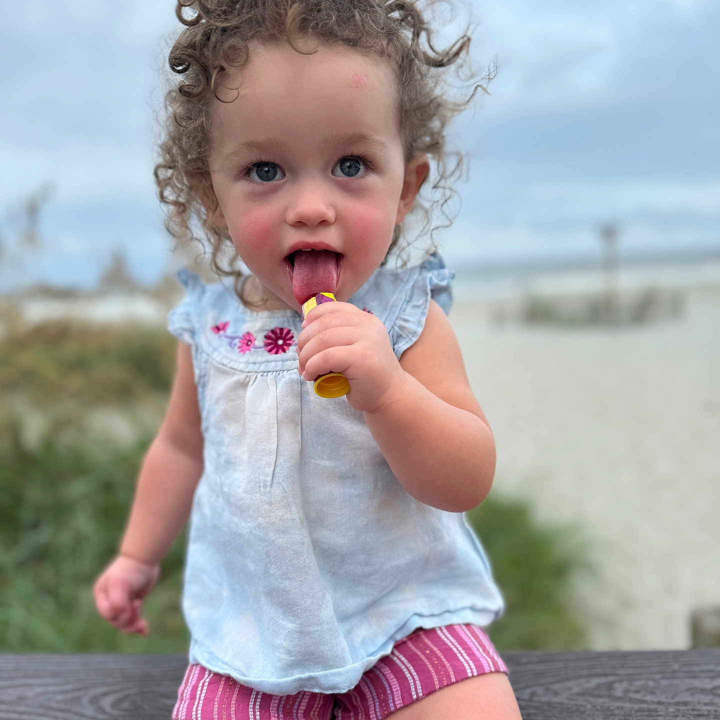Peyton joined the competition — help win amazing prizes! baby, bodypart, brush, clothing, cream, dessert, device, eating, face, finger, food, hand, head, icecream, person, photography, portrait, shorts, tool, toothbrush
