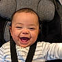 Sheridan joined the competition — help win amazing prizes! baby, smiling, happy, child, infant, car_seat, seatbelt, clothing, striped, onesie, face, head, cute, portrait, indoors, child_seat, joyful, person, young, baby_expression