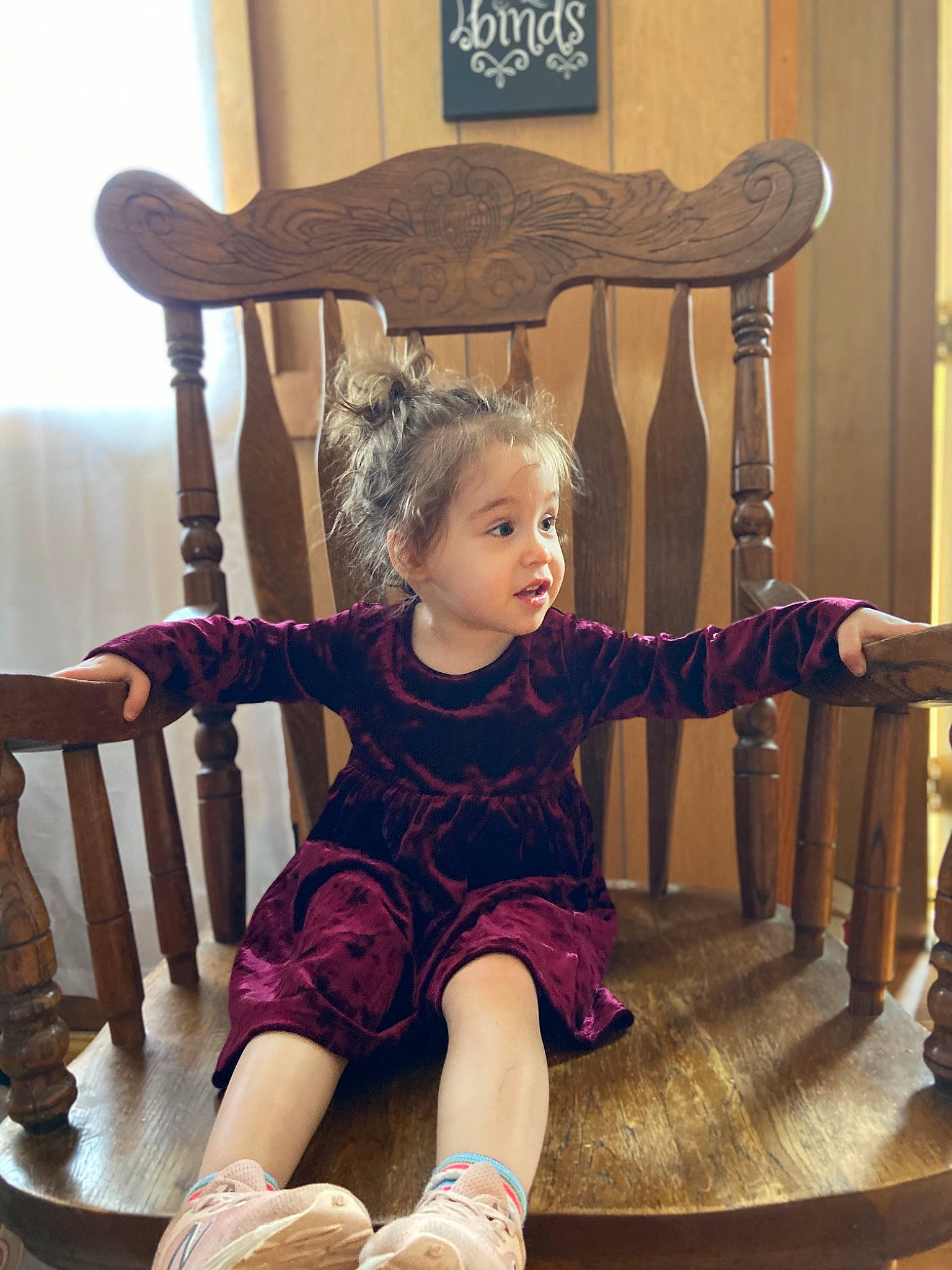 Annalee is registered to the contest to win money with this photo: chair, child, child_model, footwear, furniture, happy, leg, person, play, rocking_chair, room, shoe, shoulder, sitting, smile, toddler, vacation, wood