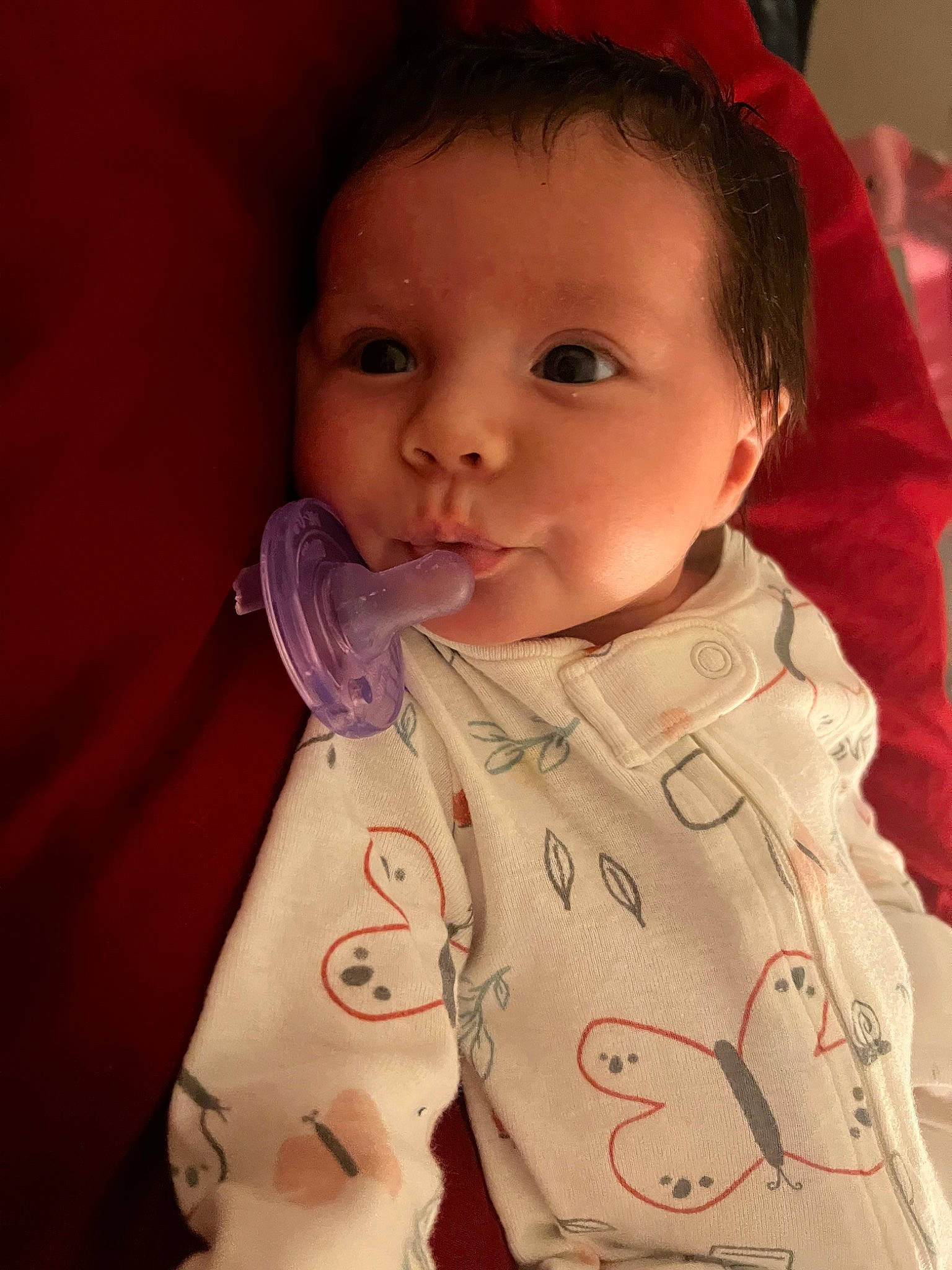 Sienna is registered to the contest to win money with this photo: baby, baby_toddler_clothing, cheek, chin, eyebrow, facial_expression, head, human_body, iris, lip, mouth, neck, nose, organ, outerwear, person, product, skin, sleeve, standing