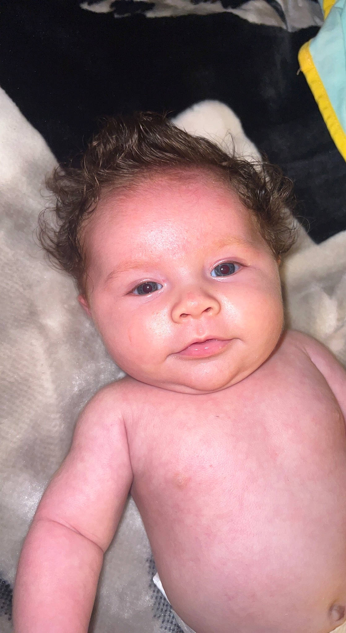 Sienna is registered to the contest to win money with this photo: baby, cheek, eye, eyebrow, eyelash, face, finger, flash_photography, gesture, hair, hand, head, human_body, iris, lip, mouth, neck, nose, person, skin