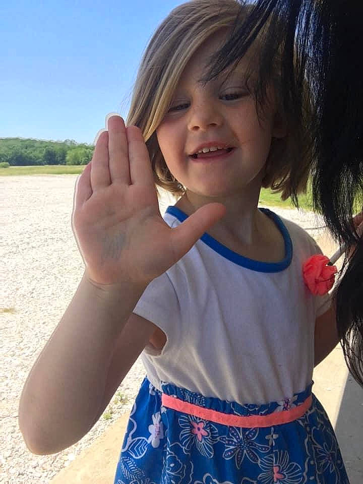 Julianna joined the competition — help win amazing prizes! arm, child, facial_expression, finger, fun, gesture, hand, happy, joy, long_hair, nose, person, sign_language, smile, summer, thumb, vacation
