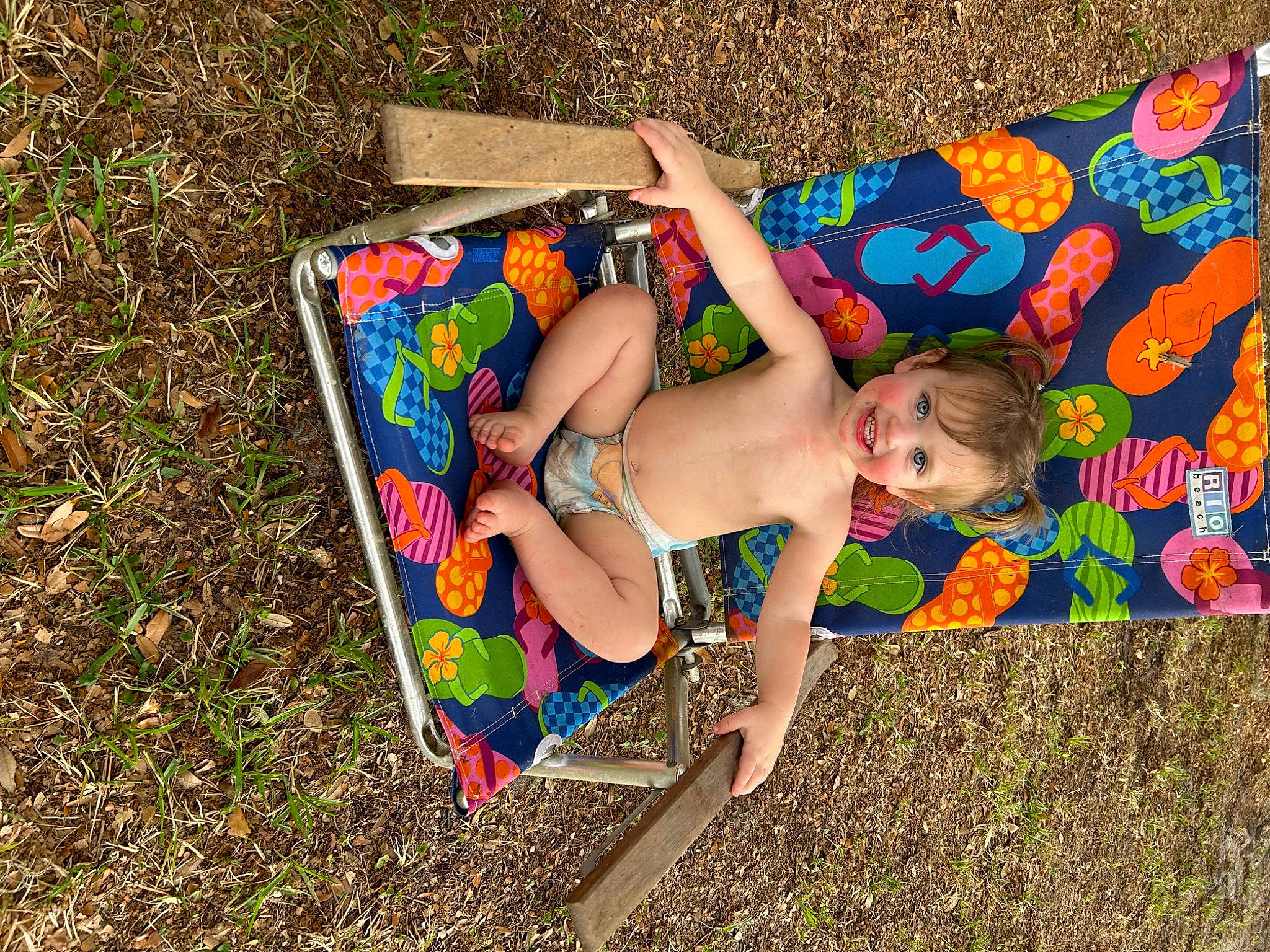 Harper joined the competition — help win amazing prizes! art, baby, barefoot, child, foot, fun, grass, human_leg, joy, leg, leisure, outdoor_furniture, pattern, people_in_nature, person, play, recreation, sitting, sun_tanning, swimwear