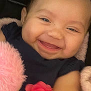 Azaelia-Ray is registered to the contest to win money with this photo: baby, smiling, happy, infant, face, blanket, pink, flower, clothing, cute, child, portrait, closeup, soft, fuzzy, warm, skin, person, joy, toddler