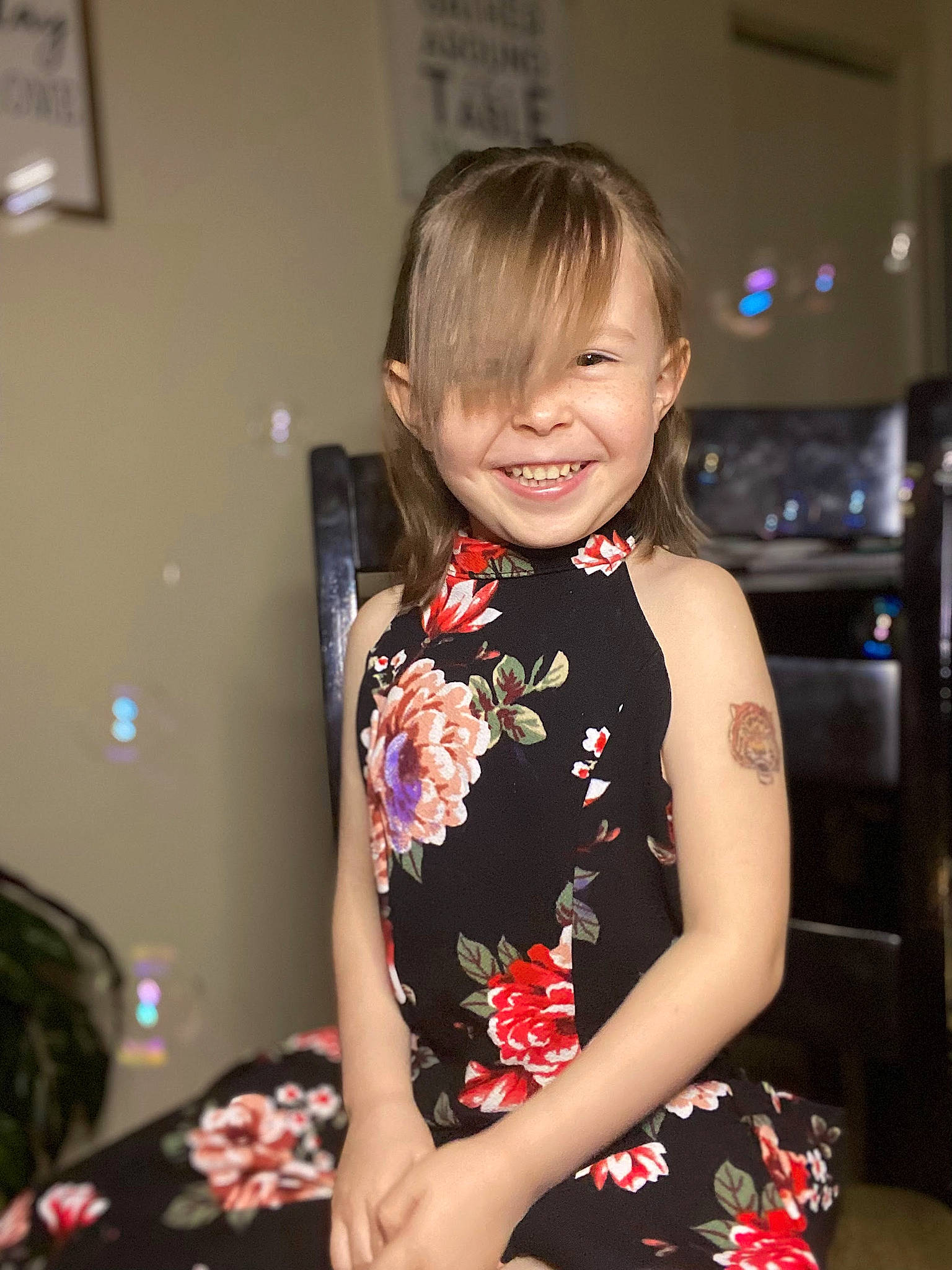 Harper joined the competition — help win amazing prizes! brown_hair, child, day_dress, event, fashion_design, formal_wear, fun, happy, human_leg, jewellery, joy, party, pattern, person, room, sitting, sleeve, smile, t_shirt, thigh