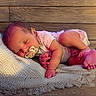 baby, newborn, sleeping, pacifier, blanket, wood_floor, infant, cute, peaceful, small_hands, small_feet, clothing, lying_down, indoors, soft_lighting, skin, head, relaxation, child, toddler