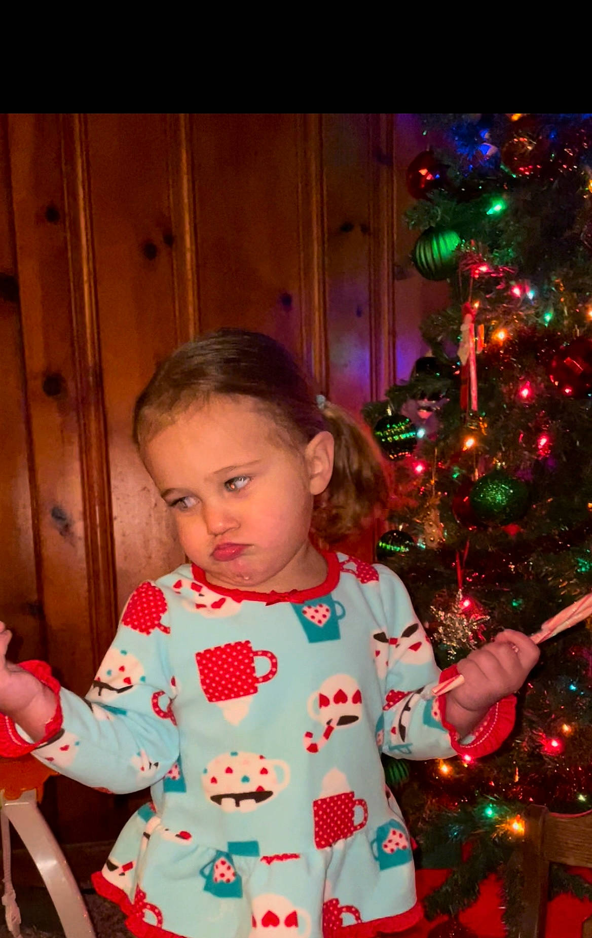 Harley Jade joined the competition — help win amazing prizes! baby_toddler_clothing, beauty, cheek, christmas_ornament, christmas_tree, evergreen, face, facial_expression, fun, hairstyle, happy, head, holiday_ornament, human_body, leaf, ornament, person, sleeve, snapshot, standing