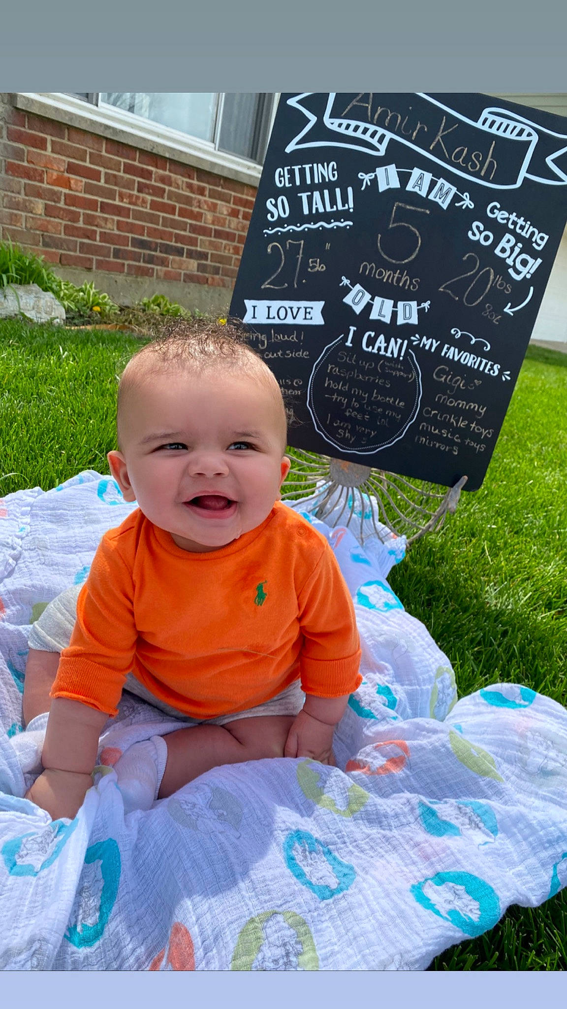 Amir is registered to the contest to win money with this photo: baby, baby_toddler_clothing, chalk, child, grass, green, person, play, sitting, toddler, yard