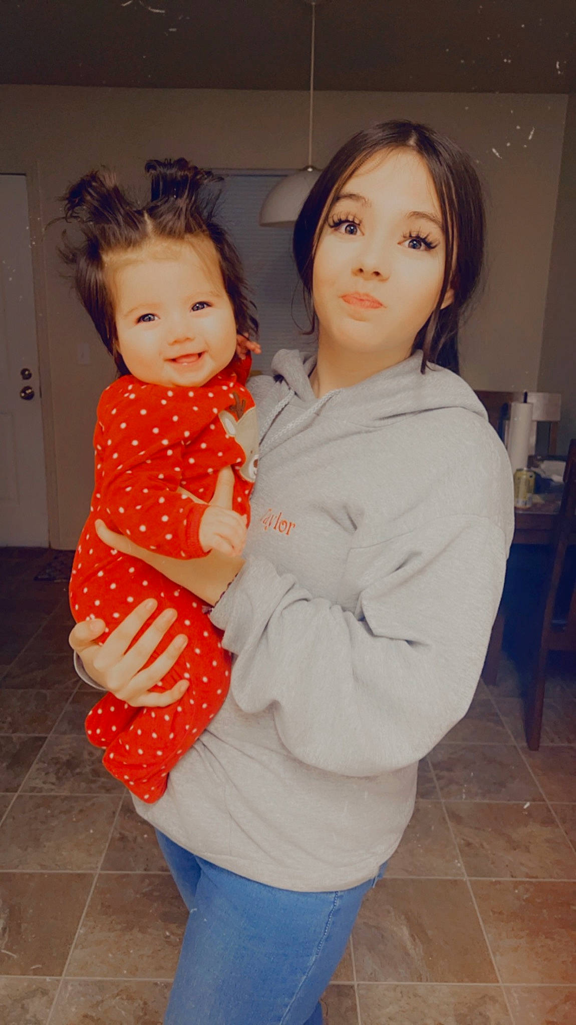 Diana is registered to the contest to win money with this photo: abdomen, baby, baby_toddler_clothing, child, event, face, finger, flash_photography, flooring, formal_wear, fun, gesture, happy, joy, lip, peach, person, skin, sleeve, smile