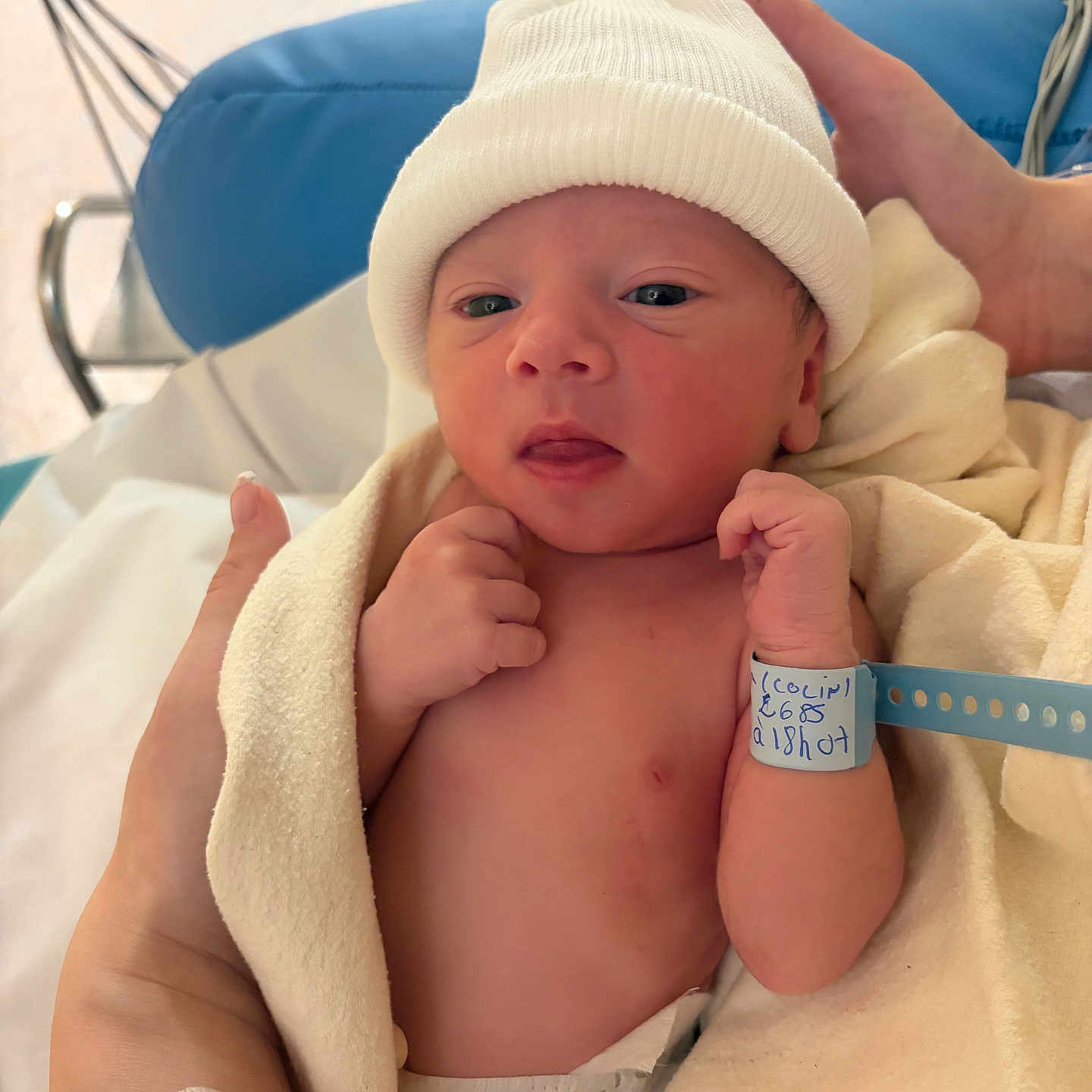 Andrea participe au concours pour gagner de l'argent avec cette photo : baby, bed, blanket, blue, care, closeup, cute, diaper, gentle, hands, hat, hospital, infant, medical, newborn, person, skin, soft, wrapped, wristband