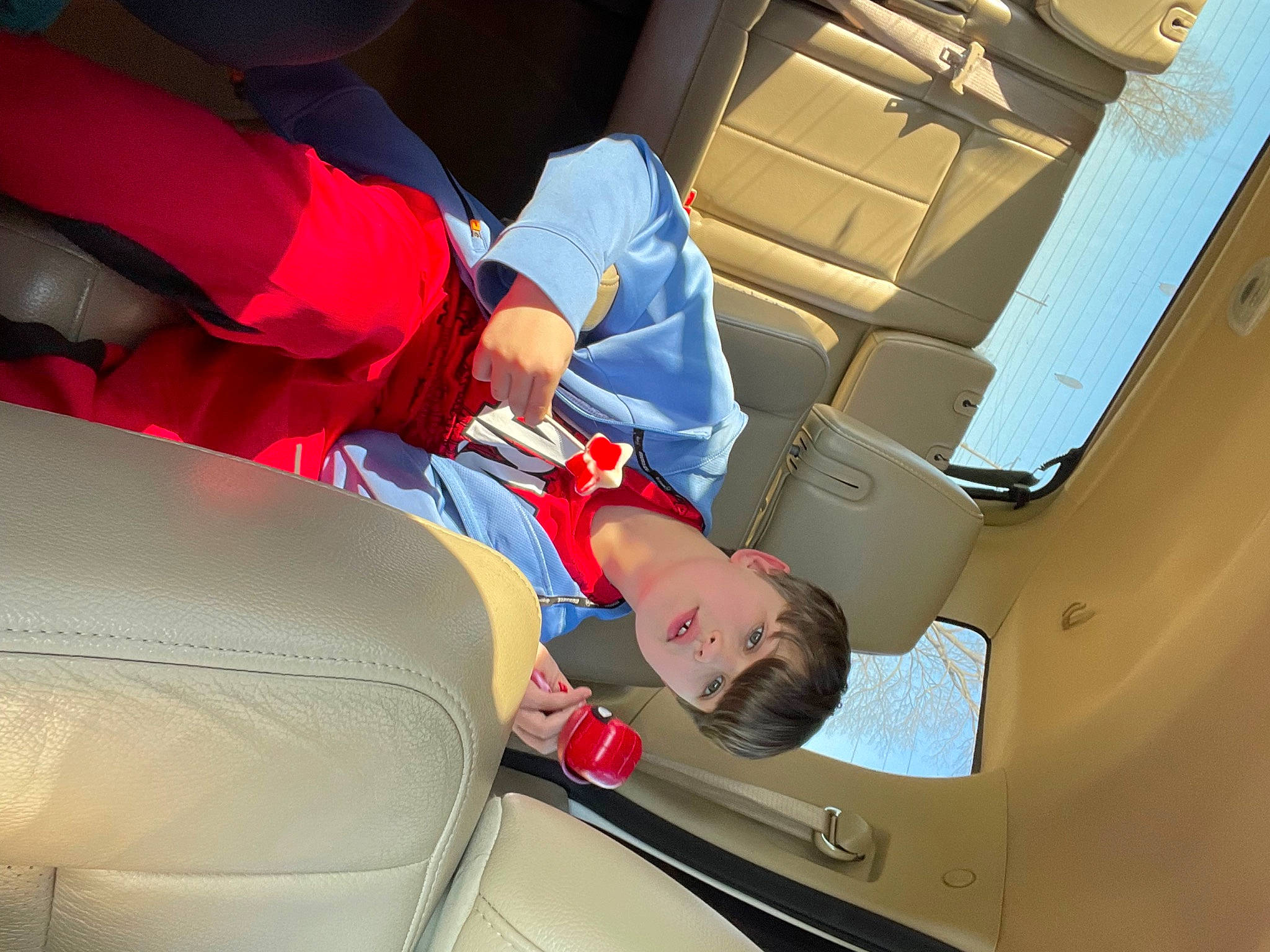 Aiden is registered to the contest to win money with this photo: airline, auto_part, automotive_design, automotive_exterior, automotive_window_part, car, car_seat, car_seat_cover, comfort, electric_blue, family_car, head_restraint, hood, luxury_vehicle, motor_vehicle, person, personal_luxury_car, service, vehicle, vehicle_door