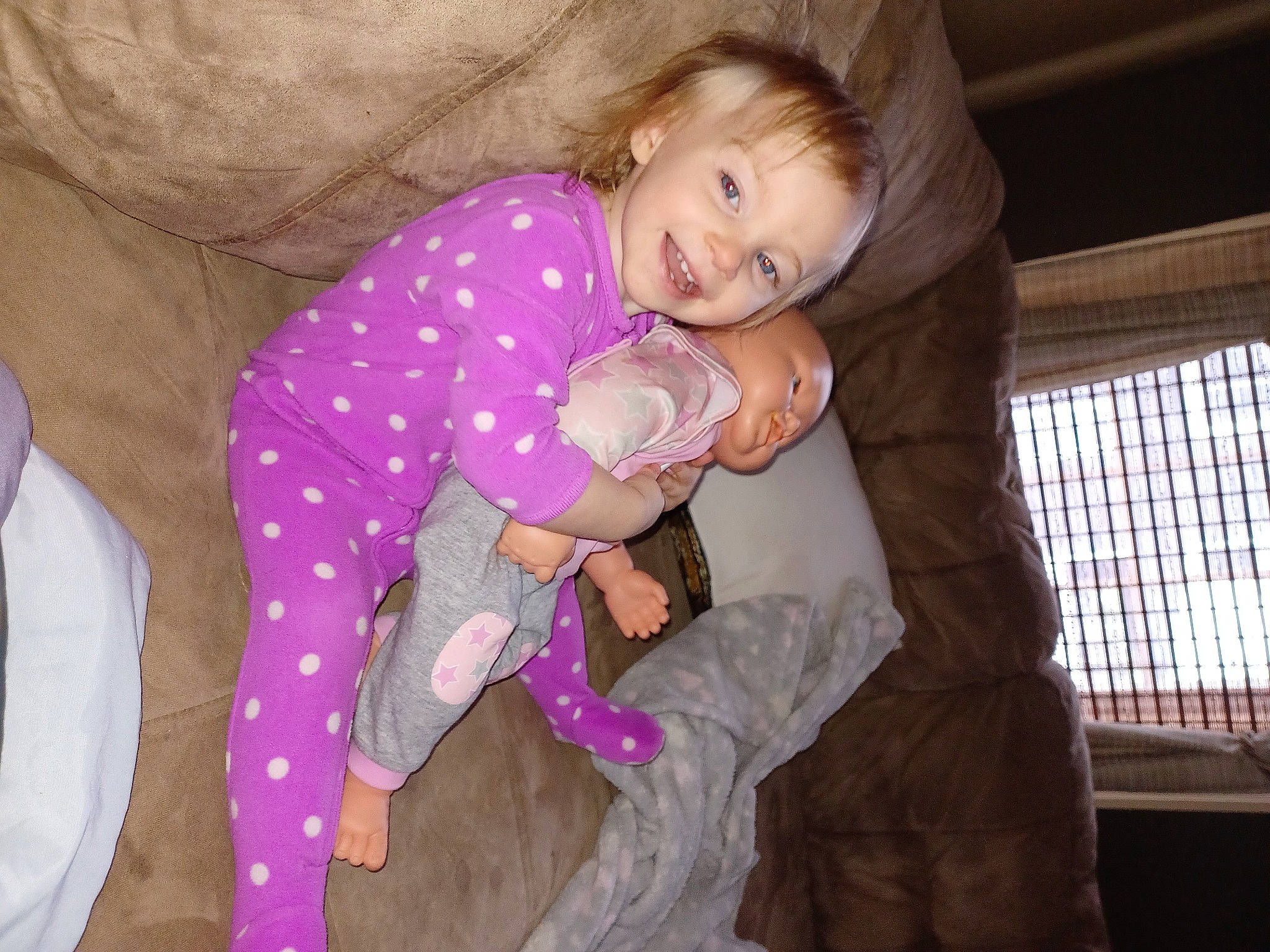 Mkenna joined the competition — help win amazing prizes! baby, baby_products, baby_toddler_clothing, child, comfort, face, flash_photography, fun, happy, human_leg, joy, lap, person, pink, purple, sitting, smile, textile, thigh, thumb