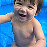 baby, child, smiling, water, pool, outdoor, summer, wet, skin, blue, diaper, cute, happy, playful, sitting, person, closeup, face, joy, infant