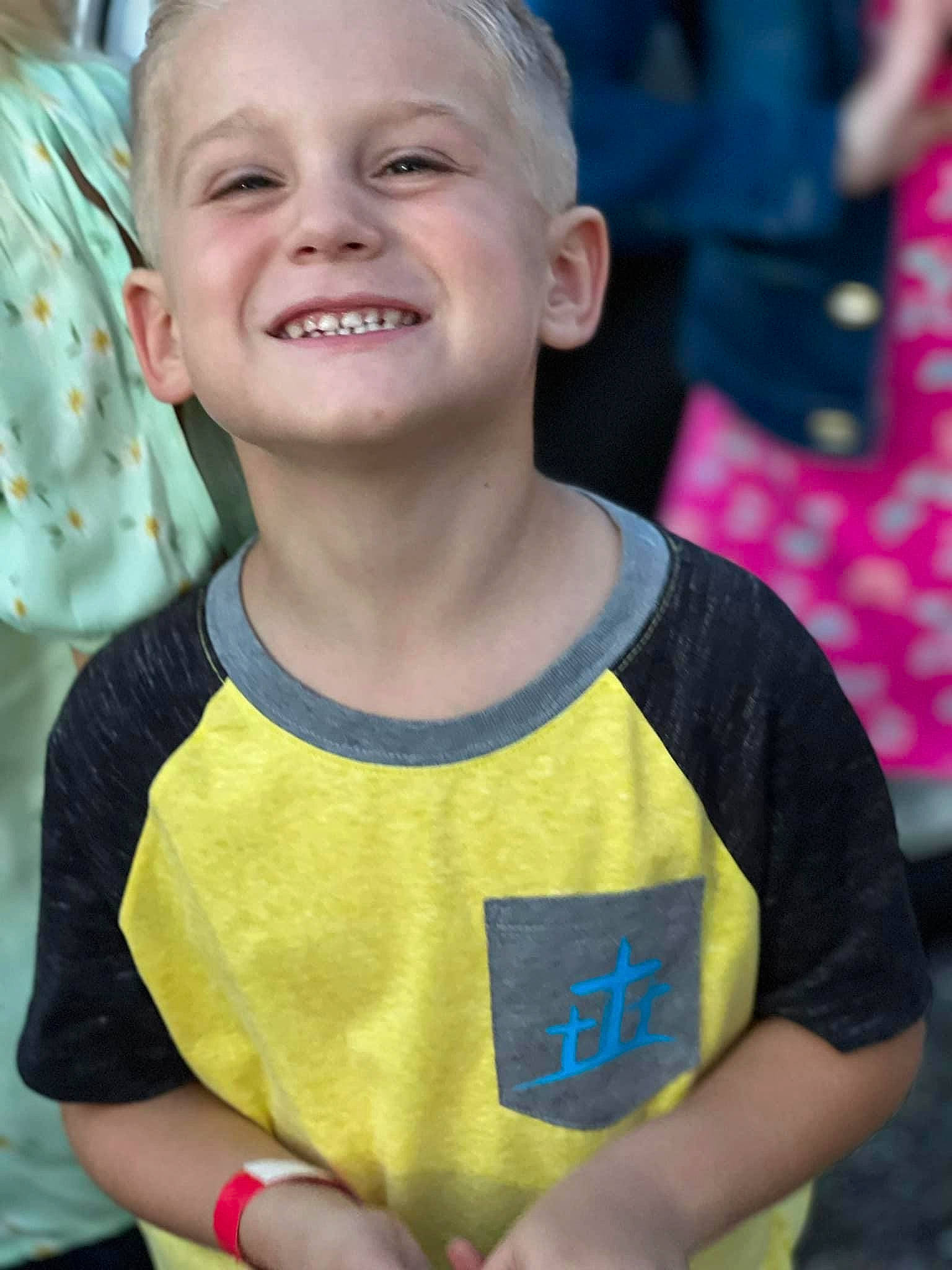 Jayce is registered to the contest to win money with this photo: adaptation, child, eye, face, fun, gesture, grass, hair, hand, happy, head, human_body, joy, leisure, people_in_nature, person, skin, sleeve, smile, summer