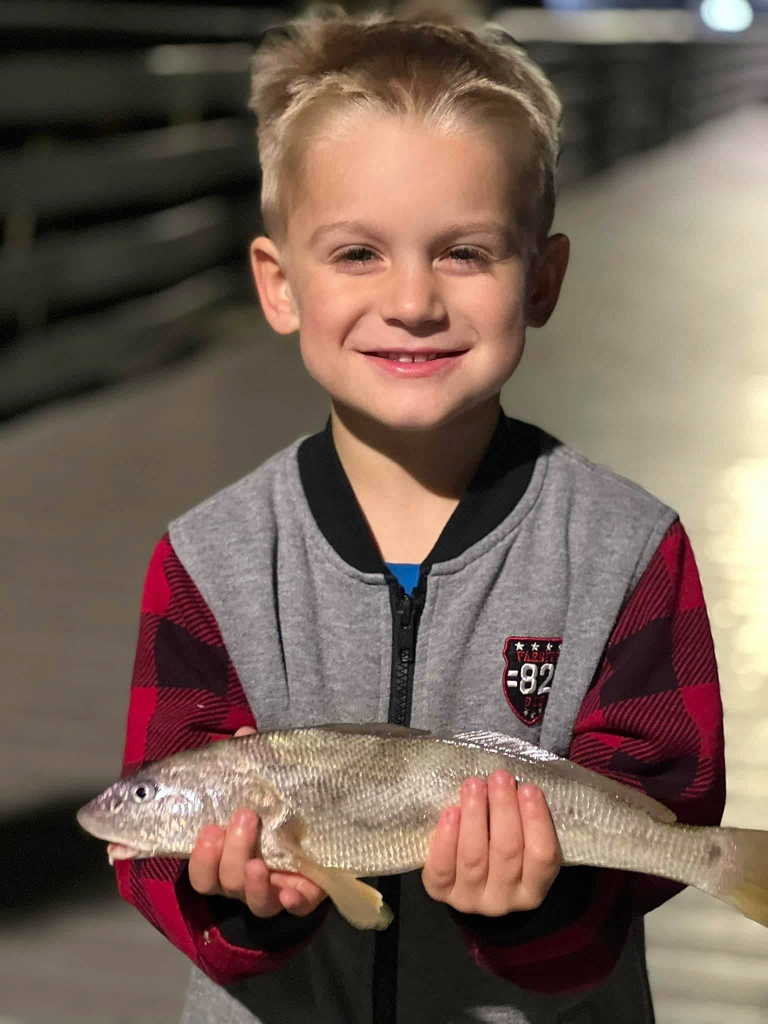 Jayce is registered to the contest to win money with this photo: bony_fish, child, electric_blue, fish, fisherman, fishing, joy, oily_fish, person, pocket, ray_finned_fish, recreation, recreational_fishing, salmon_like_fish, seafood, sleeve, smile, snapper, t_shirt, toddler