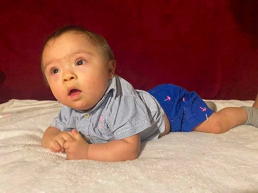 Valentin joined the competition — help win amazing prizes! baby, baby_toddler_clothing, cheek, chin, comfort, crawling, eye, flash_photography, floor, flooring, iris, linens, mouth, nose, person, skin, sleeve, smile, surprise, toddler
