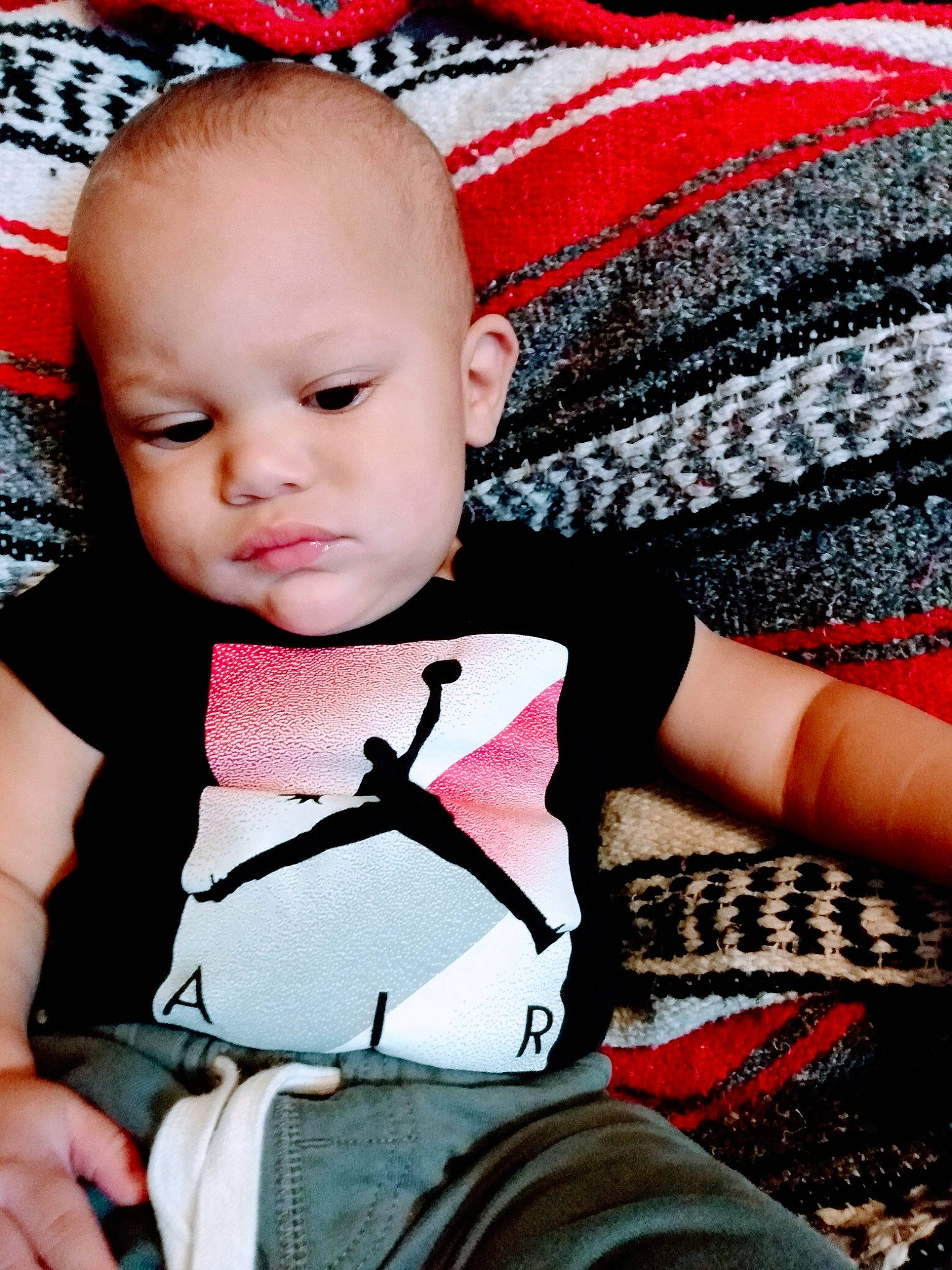 Seth Hunt is registered to the contest to win money with this photo: baby, baby_toddler_clothing, black, cheek, comfort, cool, facial_expression, fashion, happy, human, lip, magenta, organ, person, pink, product, red, skin, sleeve, textile