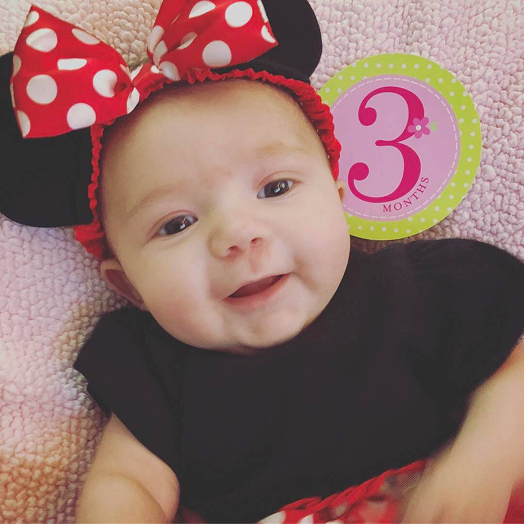 Siena is registered to the contest to win money with this photo: beanie, cap, cheek, child, design, ear, fashion_accessory, hair_accessory, hat, headband, headgear, infant, nose, person, pink, product, red, skin, smile, textile