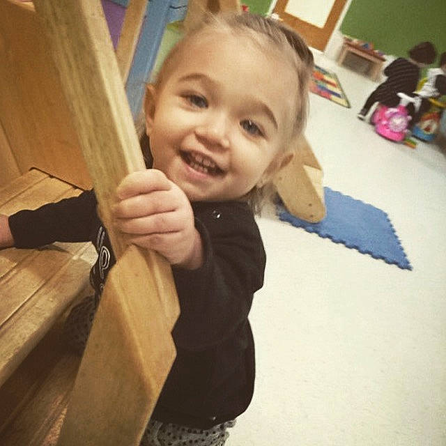 Vada is registered to the contest to win money with this photo: arm, child, chin, day, ear, eye, finger, fun, girl, hair, hairstyle, head, human_hair_color, joy, long_hair, organ, person, product, shoulder, smile