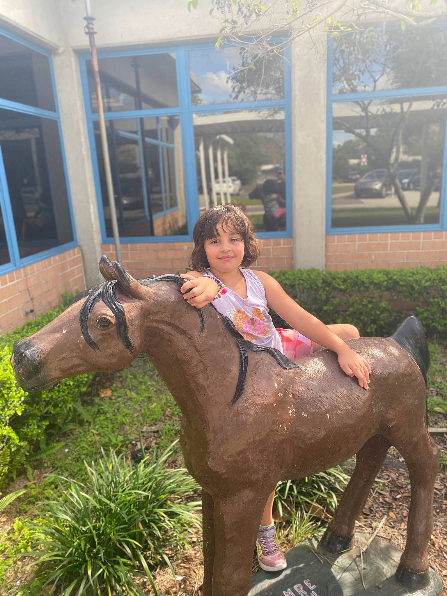 Penelope Rose is registered to the contest to win money with this photo: art, event, fawn, foot, garden, grass, happy, human_leg, joy, knee, lap, lawn, lawn_ornament, leisure, person, plant, thigh, tree, trunk, window