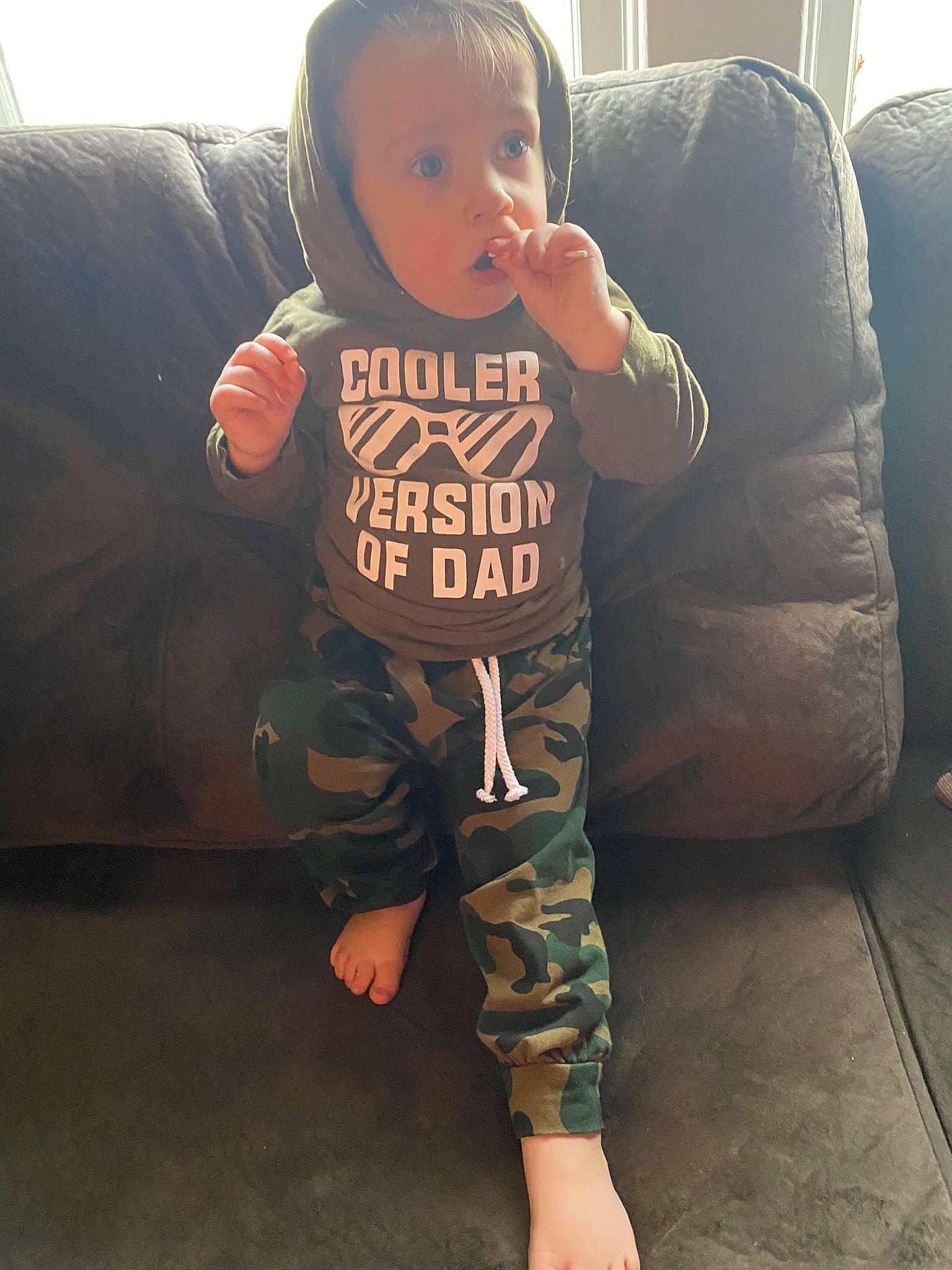 Joel Jr is registered to the contest to win money with this photo: baby_toddler_clothing, comfort, cool, elbow, eye, floor, flooring, hair, hairstyle, happy, joint, knee, leg, person, shoulder, sleeve, sportswear, t_shirt, thigh, toddler