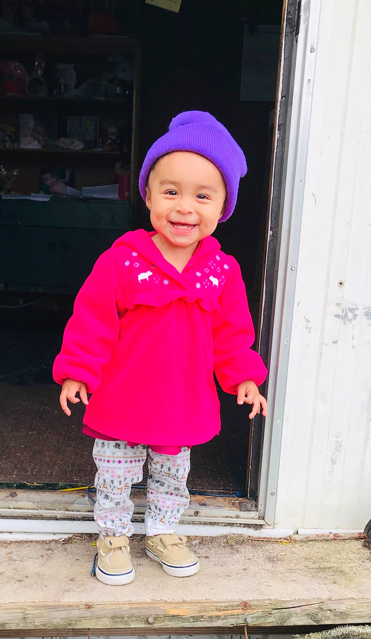 Maylee is registered to the contest to win money with this photo: cap, child, child_model, headgear, joy, magenta, outerwear, person, pink, purple, red, smile, toddler