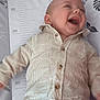 Liam participe au concours pour gagner de l'argent avec cette photo : baby, buttoned_shirt, child, clothing, cute, face, happiness, happy, head, indoors, infant, joyful, laughing, lying_down, measuring_mat, person, portrait, smiling, striped_shirt, young_child