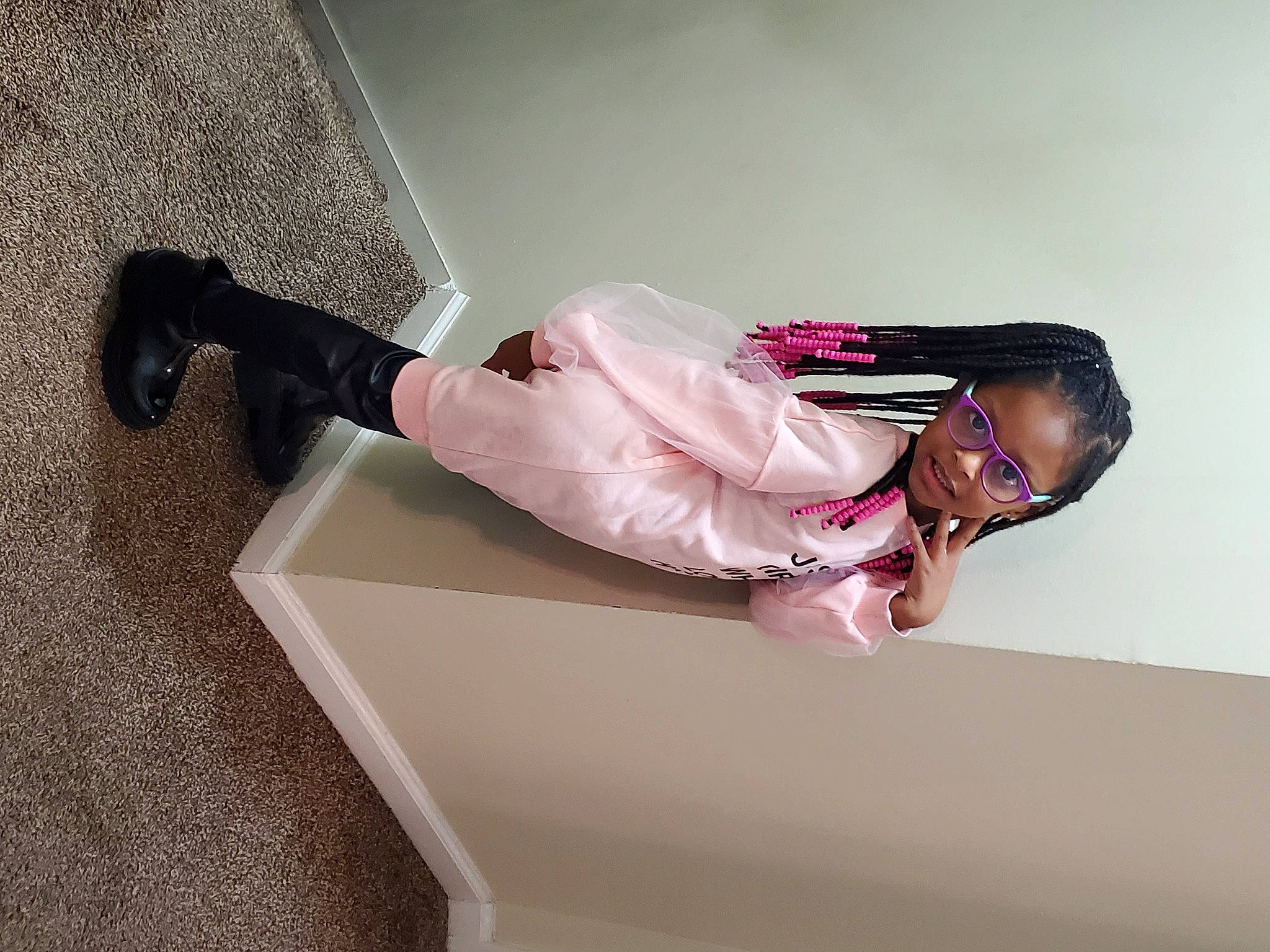 Ta'Niyah joined the competition — help win amazing prizes! comfort, elbow, fashion_design, flooring, foot, human_leg, knee, leg, magenta, person, room, sitting, sock, thigh, waist, wood, wrist