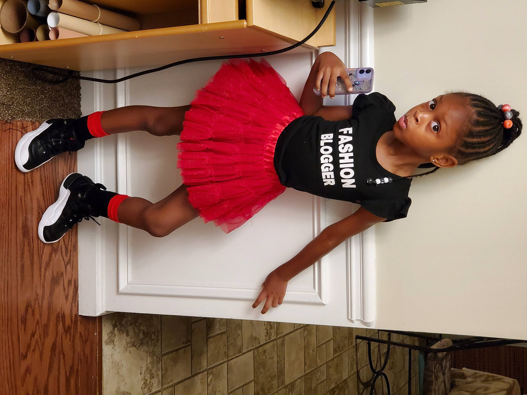 Ta'Niyah joined the competition — help win amazing prizes! balance, calf, chest, comfort, elbow, flooring, foot, fun, hip, human_leg, knee, leg, person, sandal, shorts, shoulder, sportswear, surprise, thigh, trunk