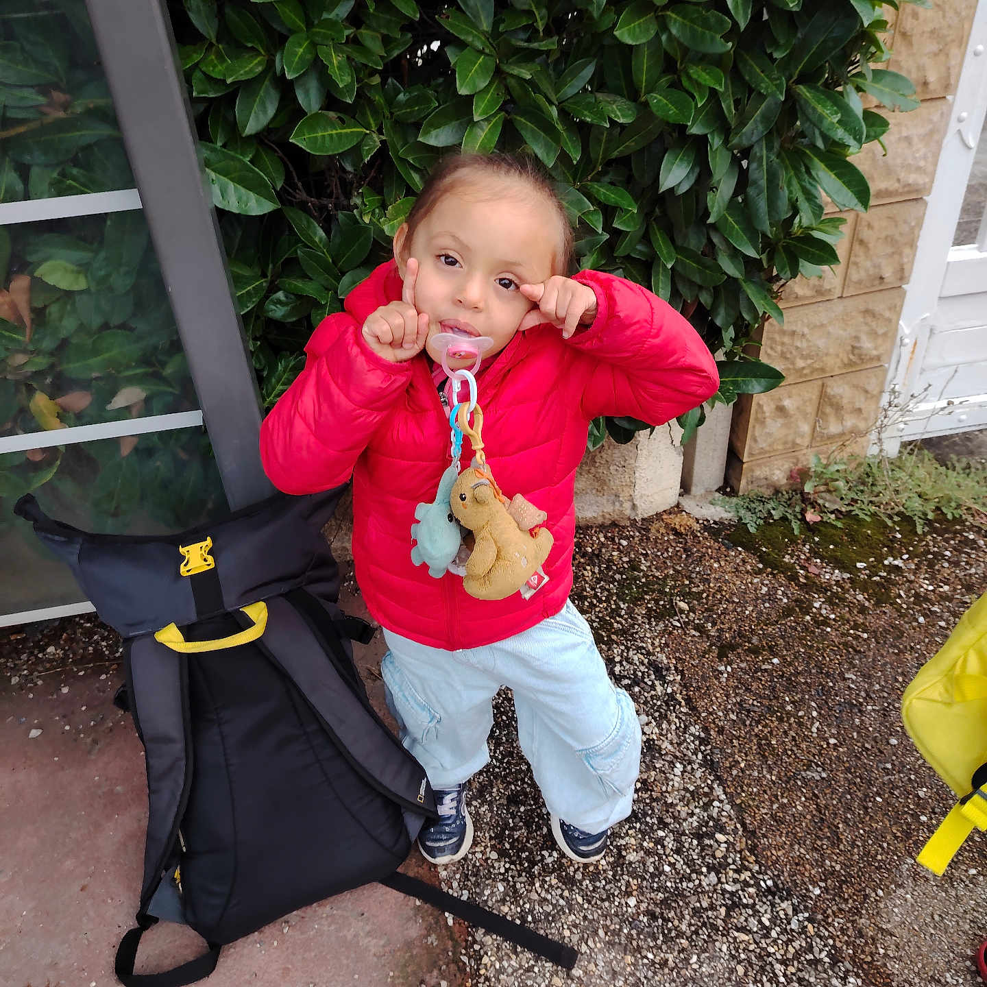 Prudence a rejoint le concours — aidez-le/la à gagner de superbes lots ! accessories, baby, backpack, bag, bodypart, clothing, coat, face, finger, footwear, hand, handbag, head, jacket, pants, person, photography, portrait, shoe, strap