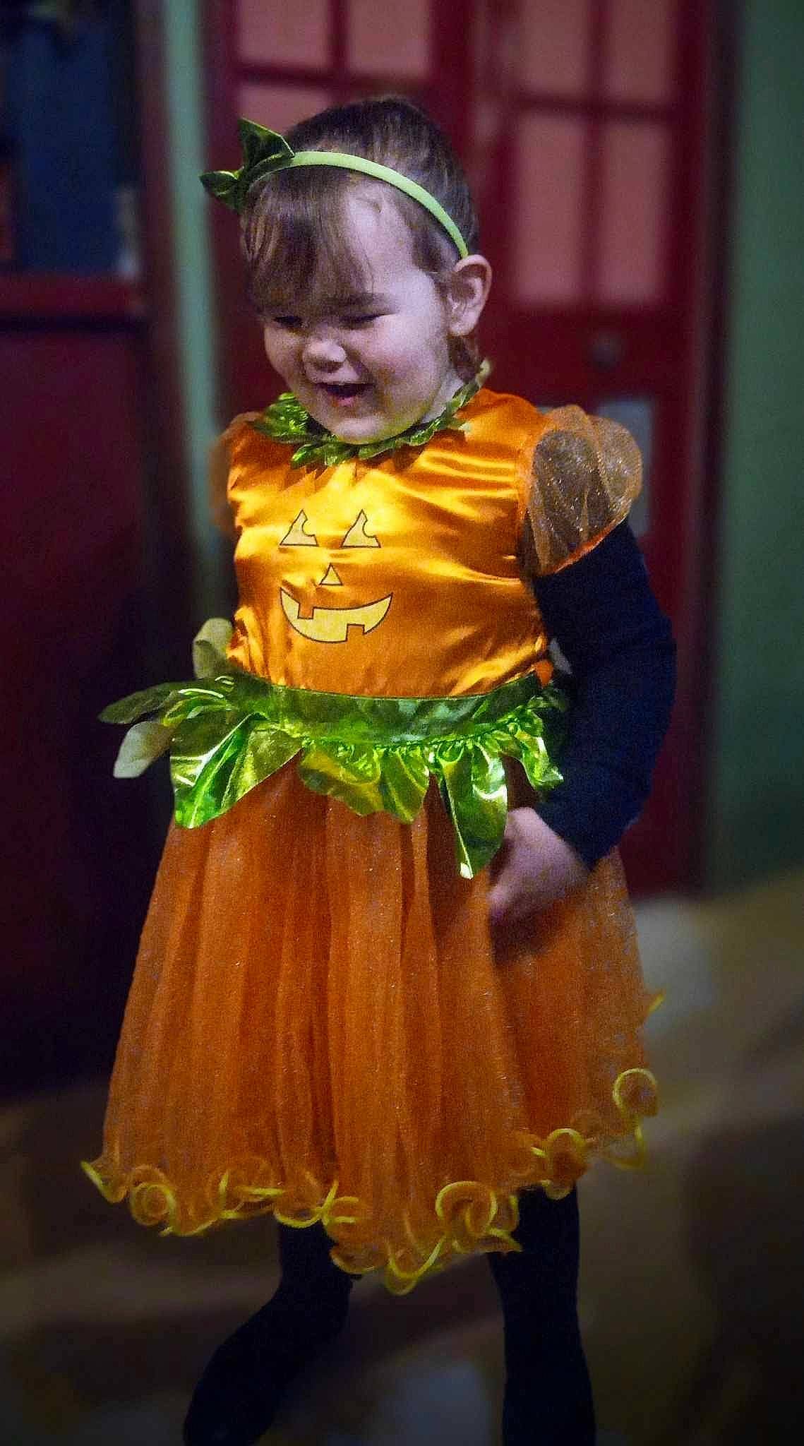 Liberty is registered to the contest to win money with this photo: child, costume, costume_design, dress, entertainment, event, face, fashion_accessory, fashion_design, formal_wear, fun, hairstyle, headgear, jewellery, peach, performing_arts, person, smile, toddler, tradition