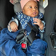 Rayanne Paulo joined the competition — help win amazing prizes! baby, infant, child, car_seat, headband, bow, jacket, harness, seatbelt, warning_label, closeup, portrait, cute, milk_on_lip, hand, little_hands, feet, socks, tulle, fabric
