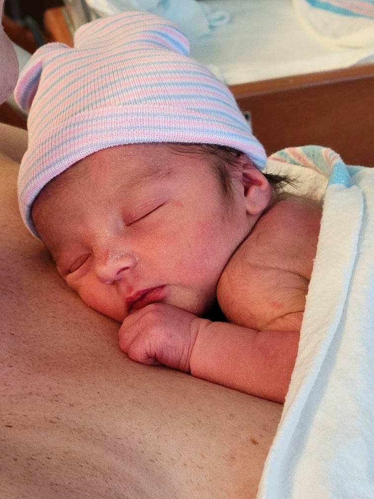 Camdyn is registered to the contest to win money with this photo: baby, baby_products, baby_sleeping, bedtime, cheek, child, childbirth, comfort, flesh, hand, hat, headwear, hospital, linens, medical, nap, person, room, service, skin