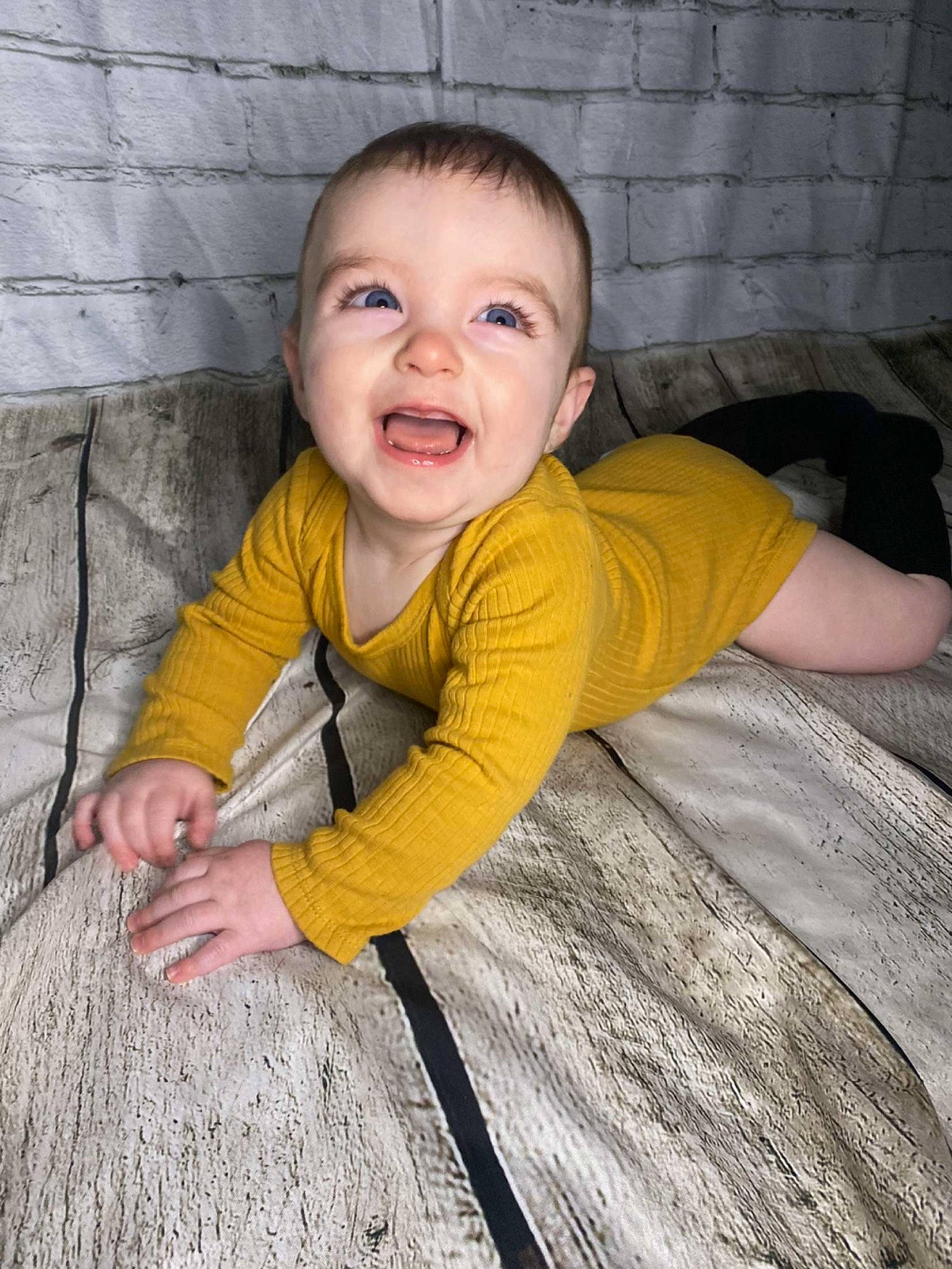 Camdyn joined the competition — help win amazing prizes! baby_toddler_clothing, cheek, comfort, dress, eye, finger, flash_photography, flooring, grass, hand, happy, head, human_body, iris, mouth, nose, person, skin, sleeve, smile