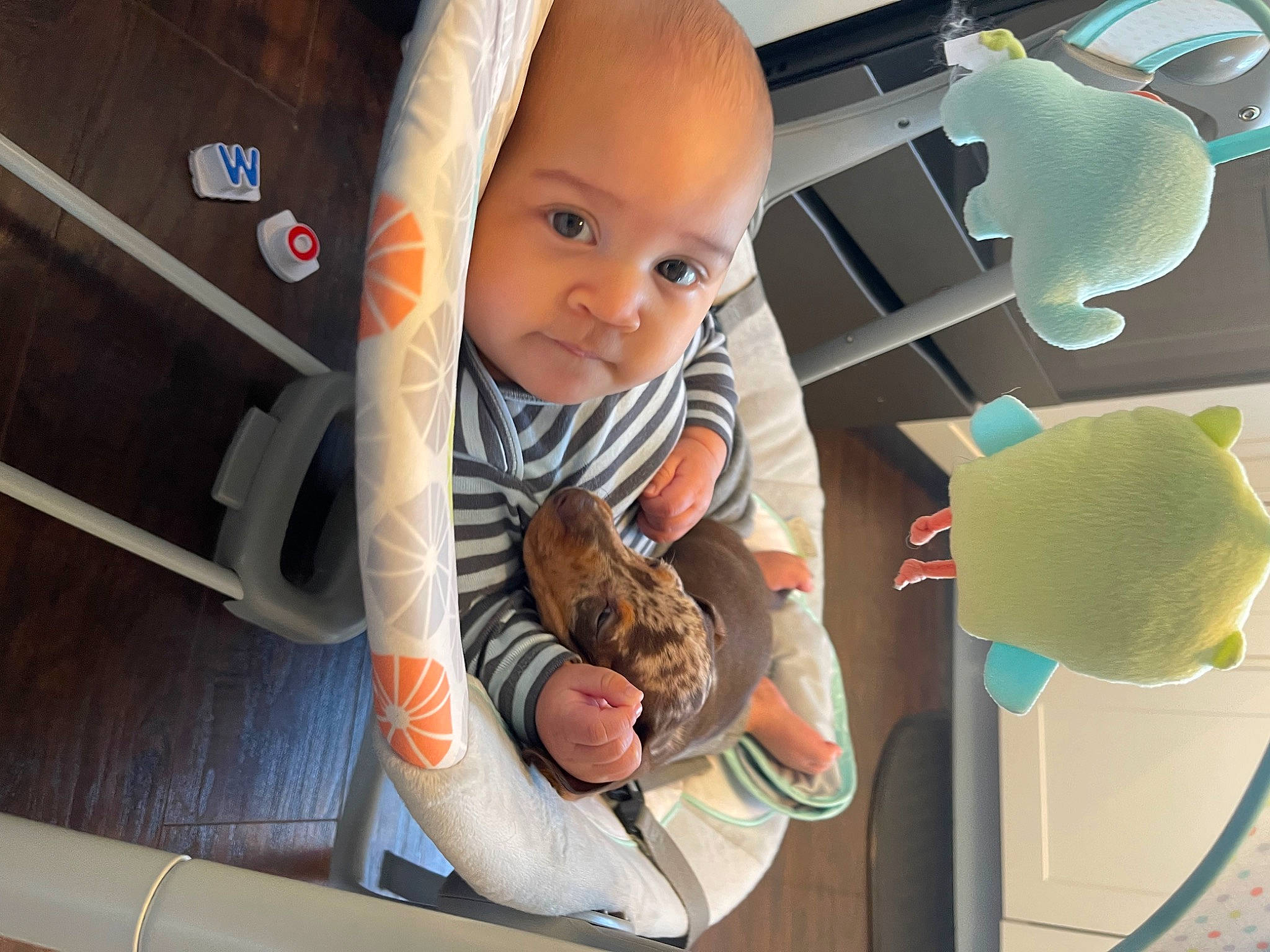 Micah is registered to the contest to win money with this photo: baby, baby_carriage, baby_products, baby_safety, baby_toddler_clothing, baby_toys, car_seat, child, comfort, finger, fun, happy, person, product, room, sitting, skin, thumb, toddler, toy