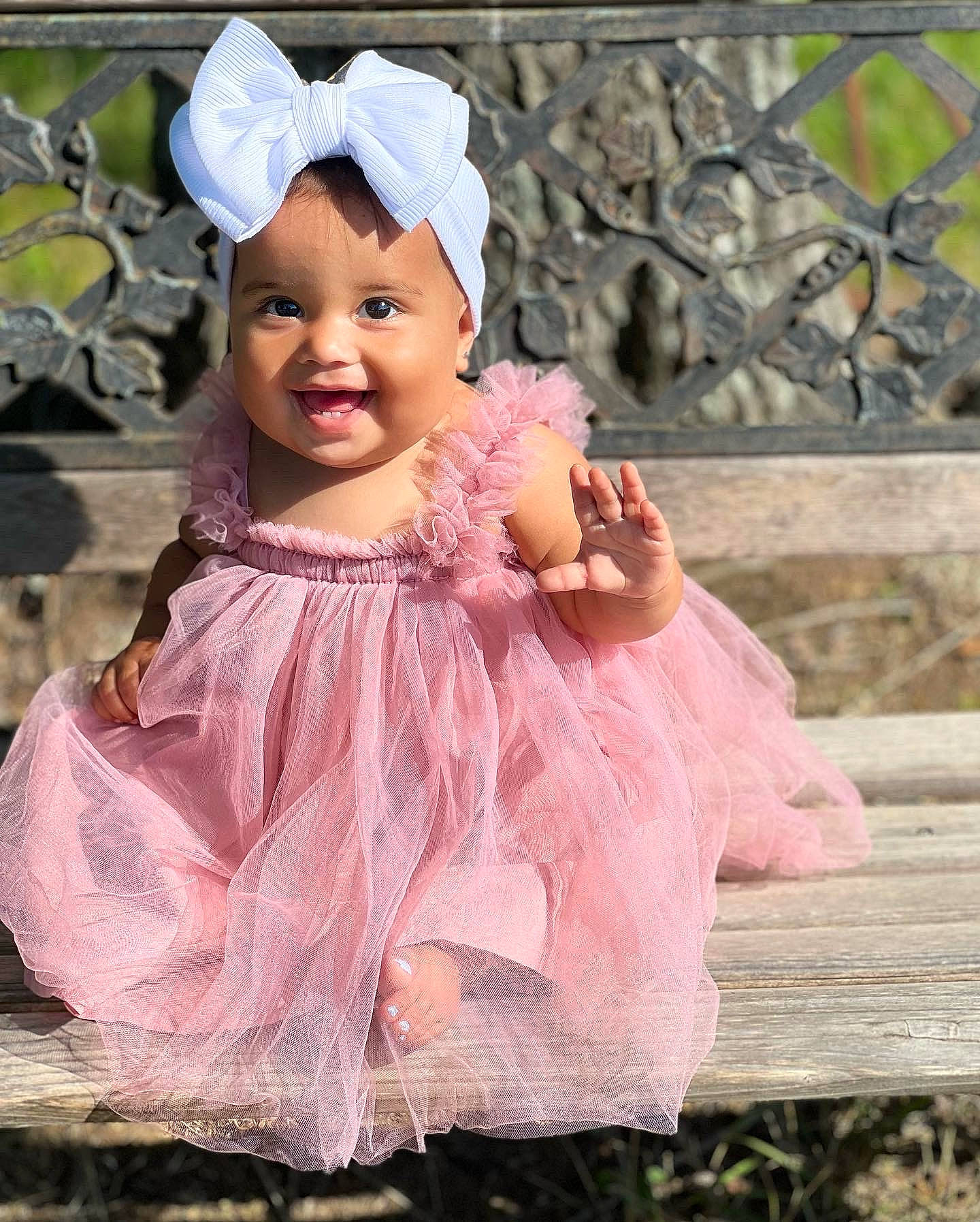 Emberly is registered to the contest to win money with this photo: baby, baby_toddler_clothing, costume, dress, embellishment, event, fashion_accessory, fun, hair_accessory, happy, headband, headpiece, jewellery, magenta, person, pink, purple, ruffle, smile, sun_hat
