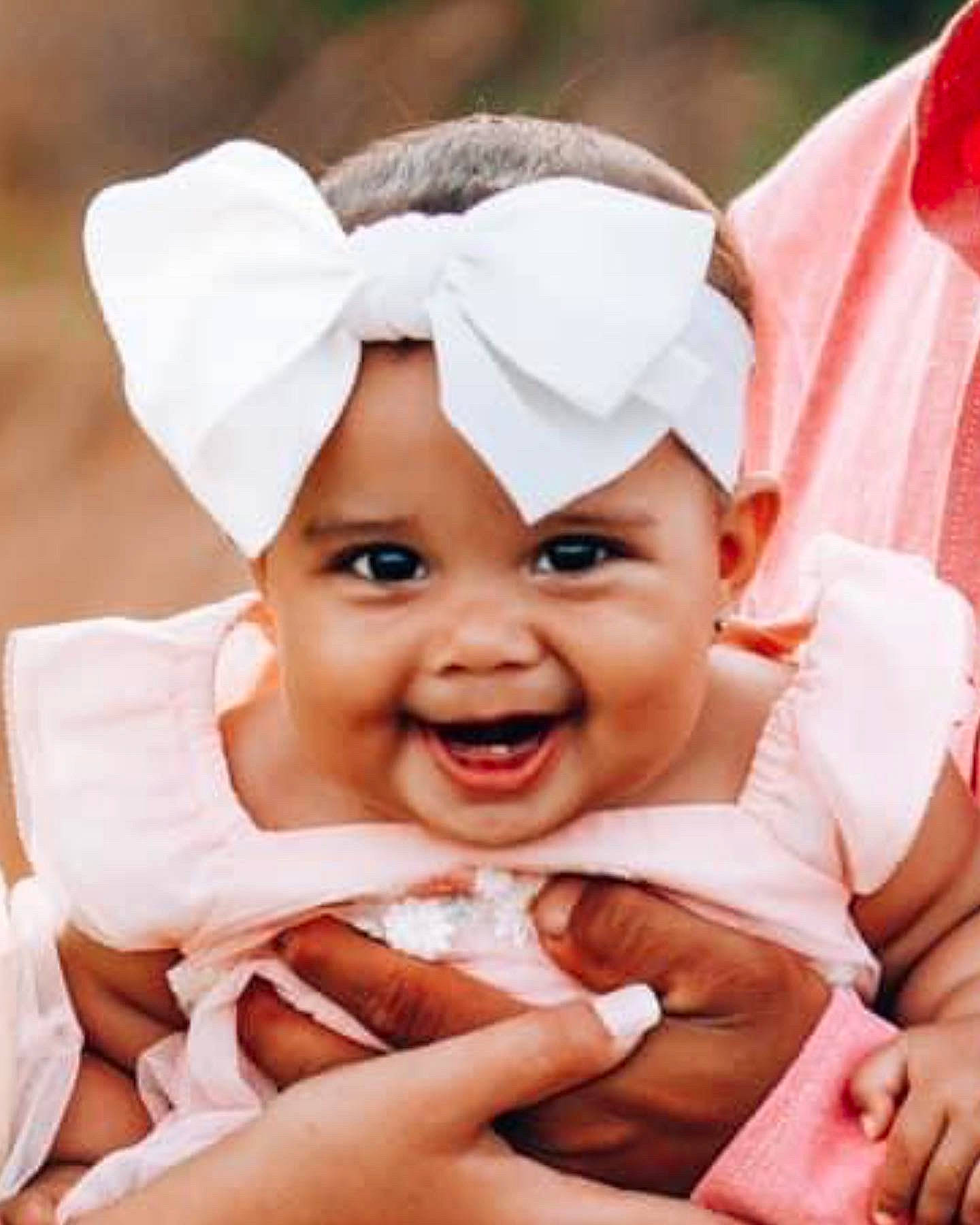 Emberly joined the competition — help win amazing prizes! baby, cheek, eye, face, facial_expression, flash_photography, gesture, hand, happy, hat, headgear, headwear, lip, mouth, people_in_nature, person, photograph, pink, skin, smile