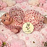 Cecilia is registered to the contest to win money with this photo: baby, infant, portrait, lying_down, smiling, pink, dress, bow, headband, shoes, flowers, blossoms, hearts, blanket, furry_blanket, milestone, two_months, indoor, celebration, photography