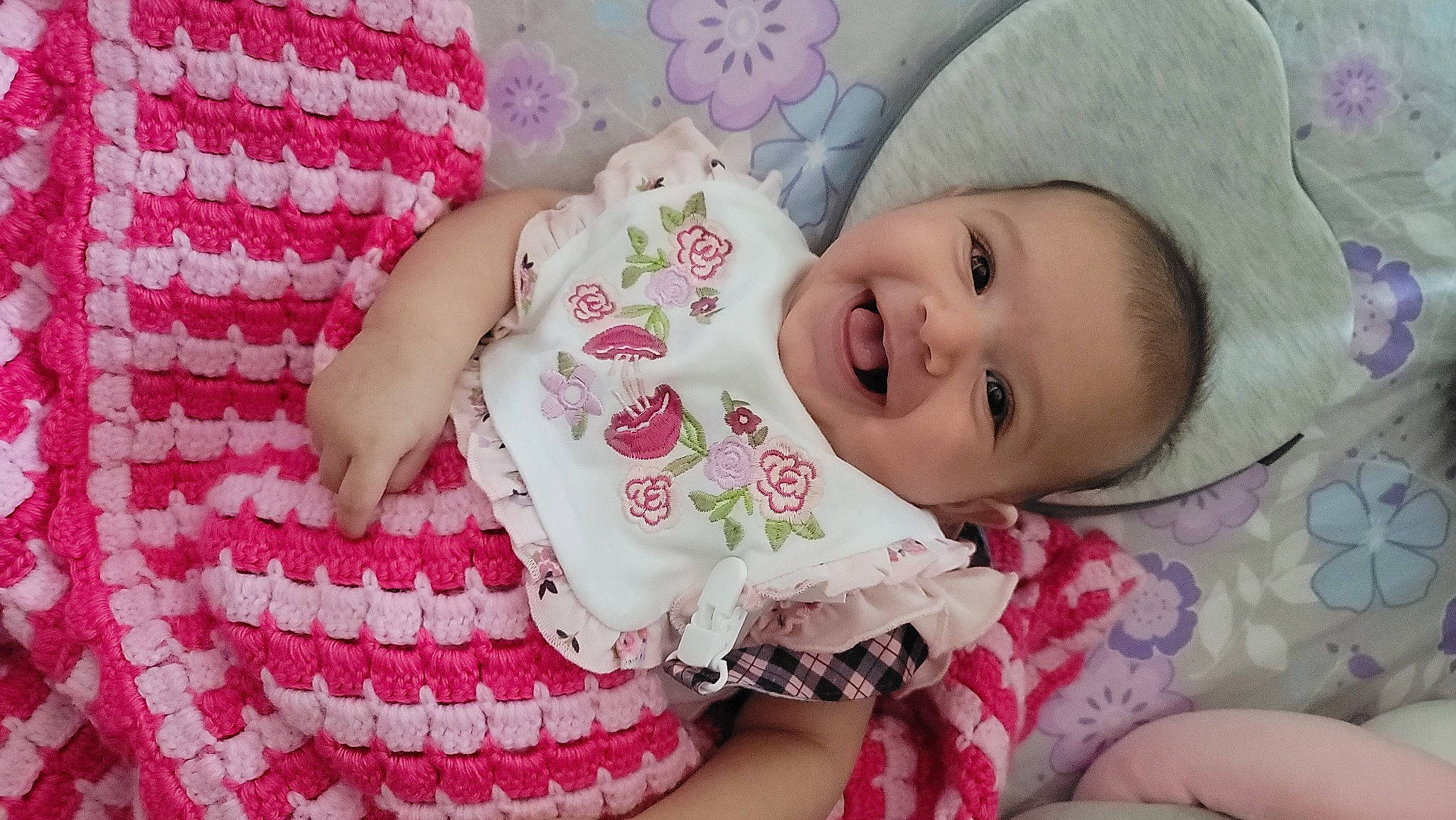 Valerie is registered to the contest to win money with this photo: baby, baby_toddler_clothing, cheek, clothing, dress, eye, face, facial_expression, happy, head, headgear, joy, lip, person, pink, product, purple, skin, sleeve, smile