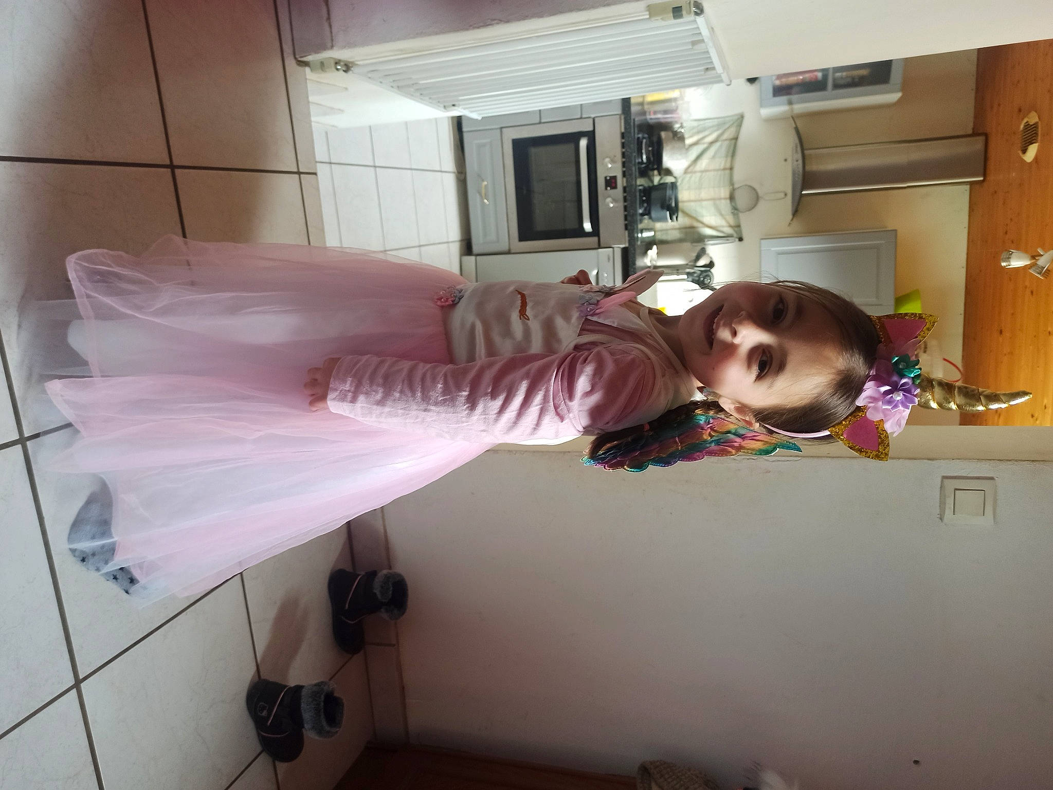 Myléna participe au concours pour gagner de l'argent avec cette photo : ballet_tutu, cabinetry, ceiling, child, clothing, dress, fashion_design, flooring, fun, hair, hair_coloring, house, joy, magenta, person, pink, purple, room, selfie, shelf