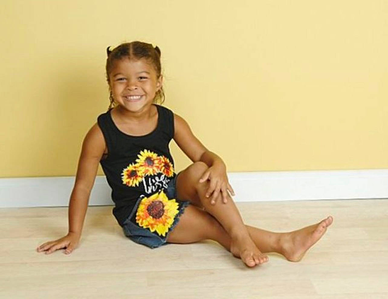 Juliahna joined the competition — help win amazing prizes! active_tank, baby_toddler_clothing, balance, barefoot, event, floor, flooring, happy, human_leg, joy, knee, leg, neck, performing_arts, person, physical_fitness, sitting, smile, sportswear, t_shirt