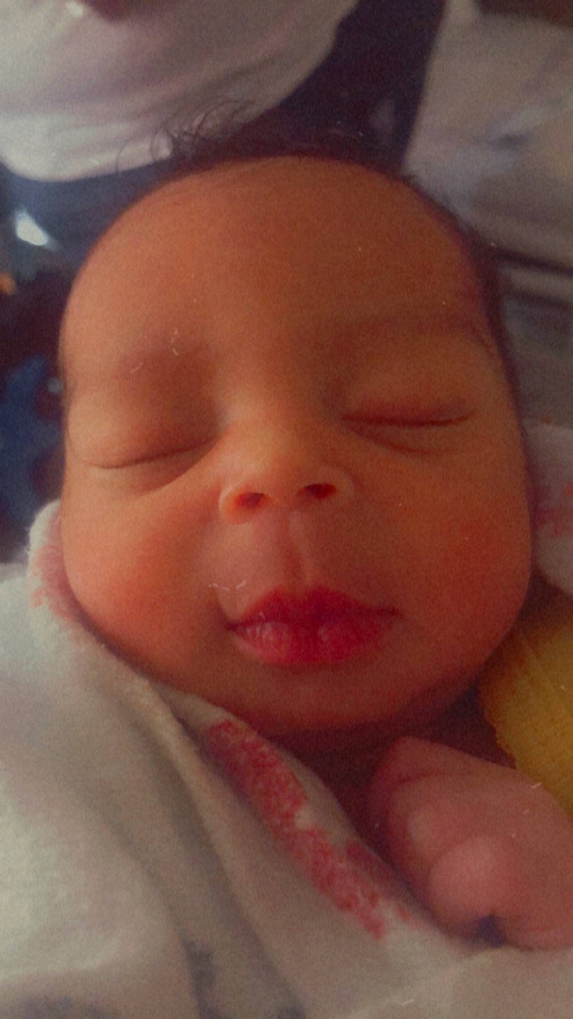 Sybria is registered to the contest to win money with this photo: baby, cheek, chin, ear, eye, eyebrow, eyelash, finger, forehead, gesture, hand, head, iris, lip, mammal, mouth, neck, nose, person, skin